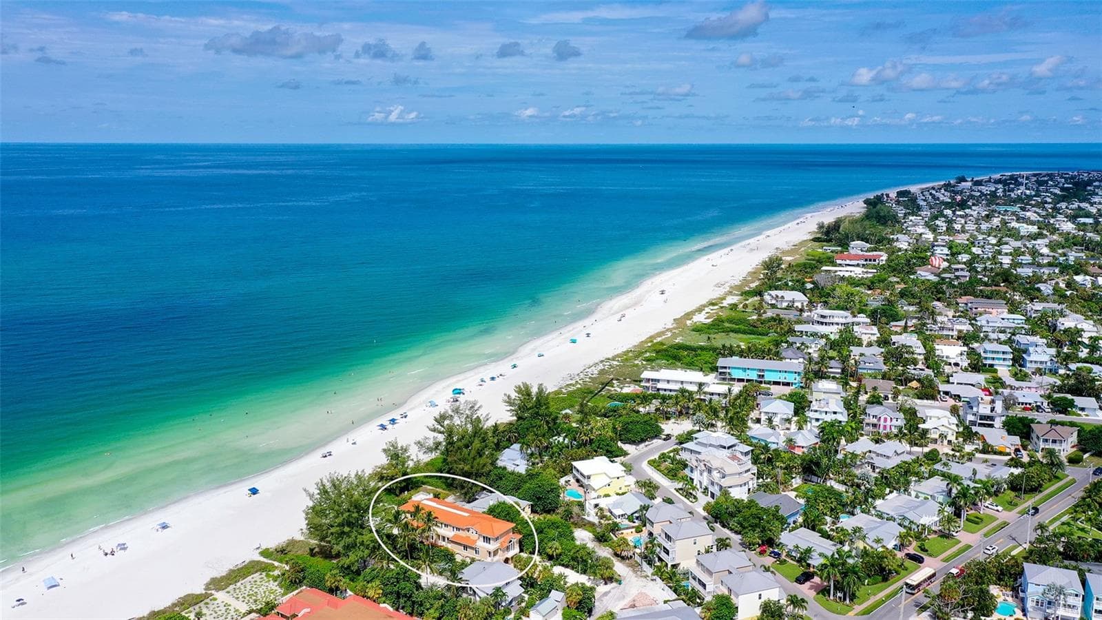 View to the north of the beautiful beaches of Holmes Beach towards the City of Anna Maria - 106 74TH ST #100, HOLMES BEACH