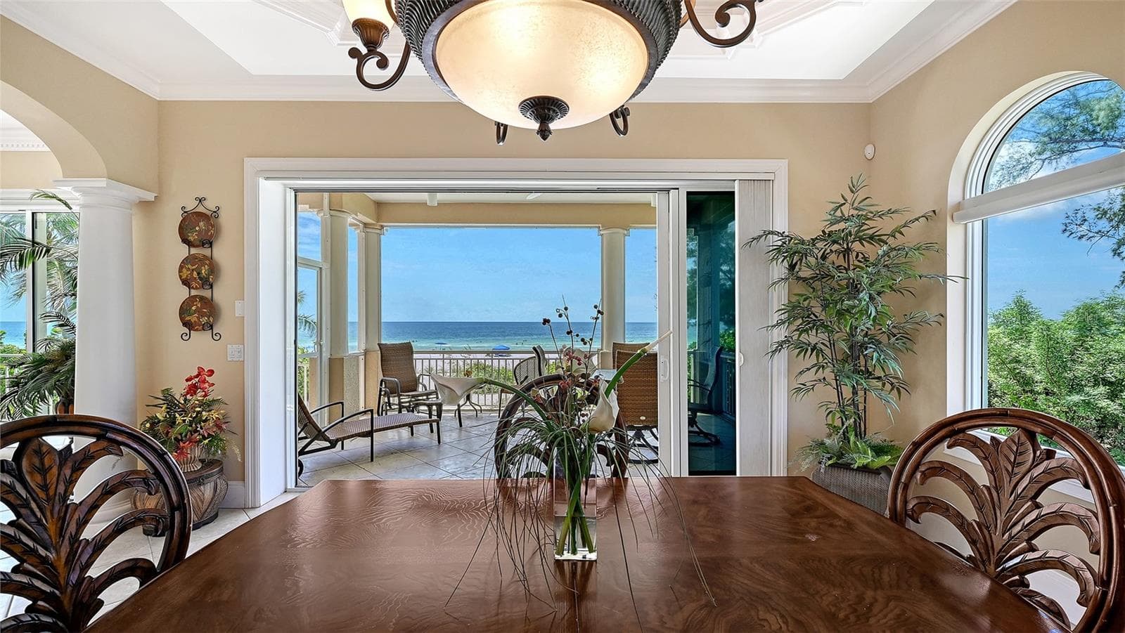 In cooler weather you can open the sliding glass doors and let the sea breeze in. - 106 74TH ST #100, HOLMES BEACH