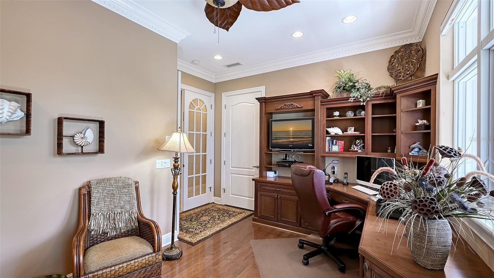 Partial view of current home office with build in cabinetry and private balcony. - 106 74TH ST #100, HOLMES BEACH