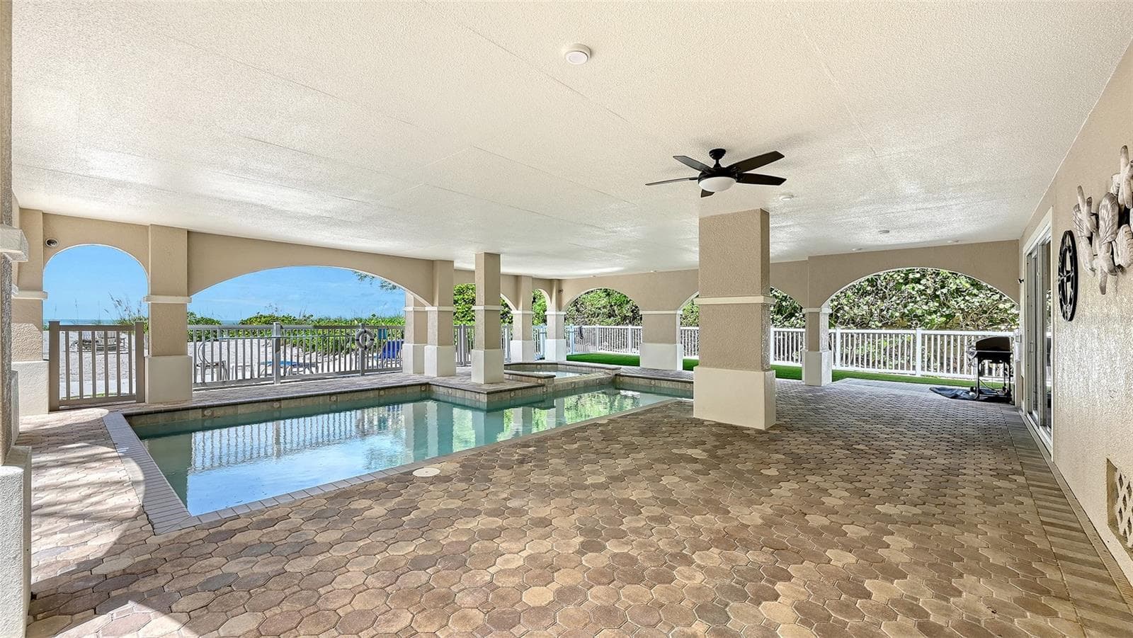 Lots of shaded space to relax or entertain. - 106 74TH ST #100, HOLMES BEACH