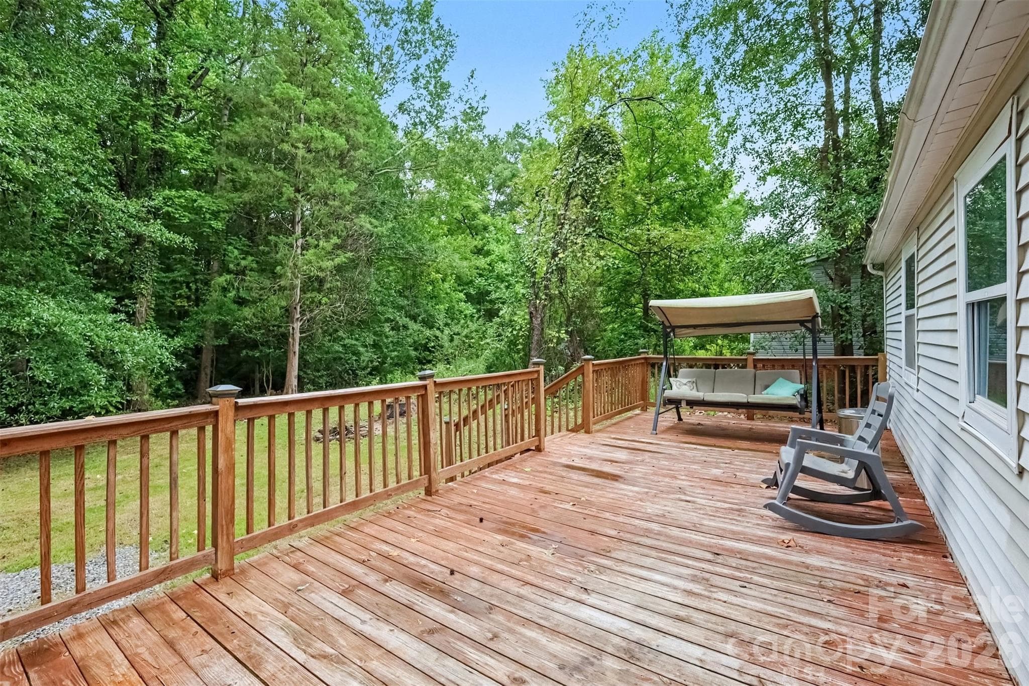 Rocking chair back deck - 802 Stowe Drive, Lowell