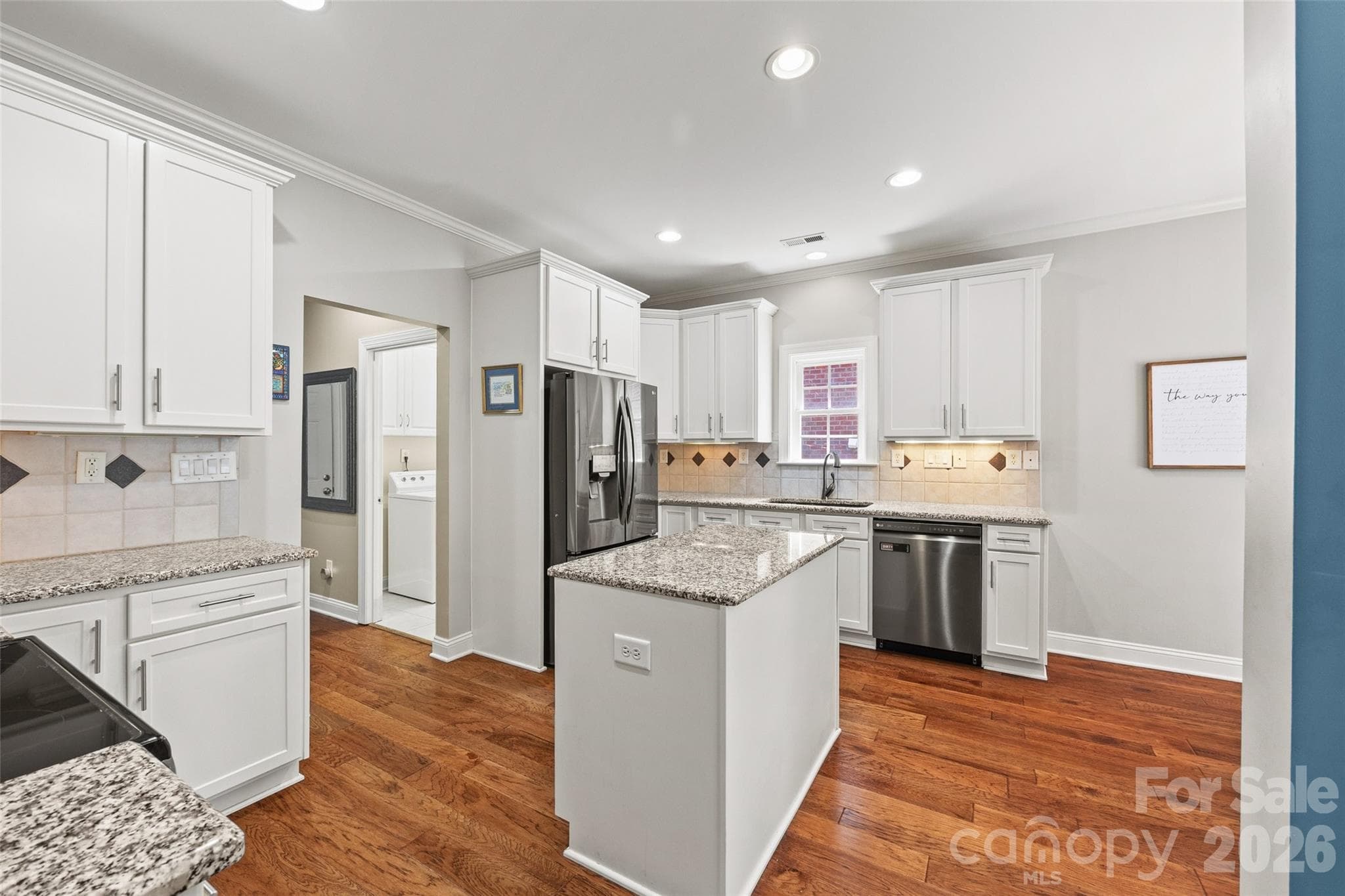 Updated kitchen with refaced cabinets and pull out drawers in the Island. One additional pull out drawer and pull out trash can - 771 Cherry Hills Place, Rock Hill