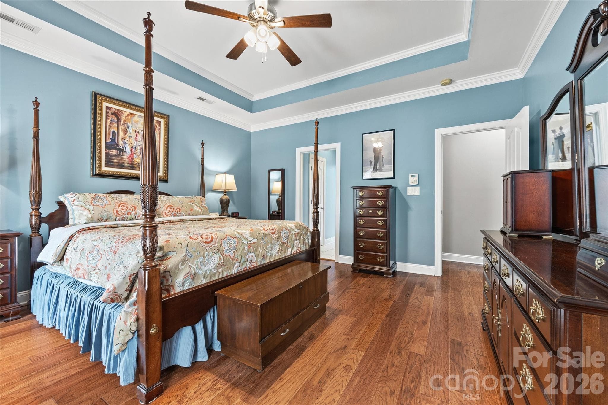 The Primary Suite is complete with hardwood floors, trey ceiling, and his and hers walk in closets - 771 Cherry Hills Place, Rock Hill