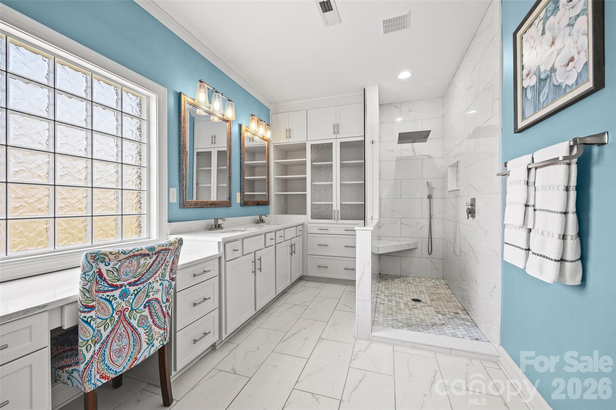 Totally renovated luxurious Primary bath. Huge Walk-in Shower, Custom Built ins with lots of storage, a spacious vanity with drawers and granite countertops - 771 Cherry Hills Place, Rock Hill