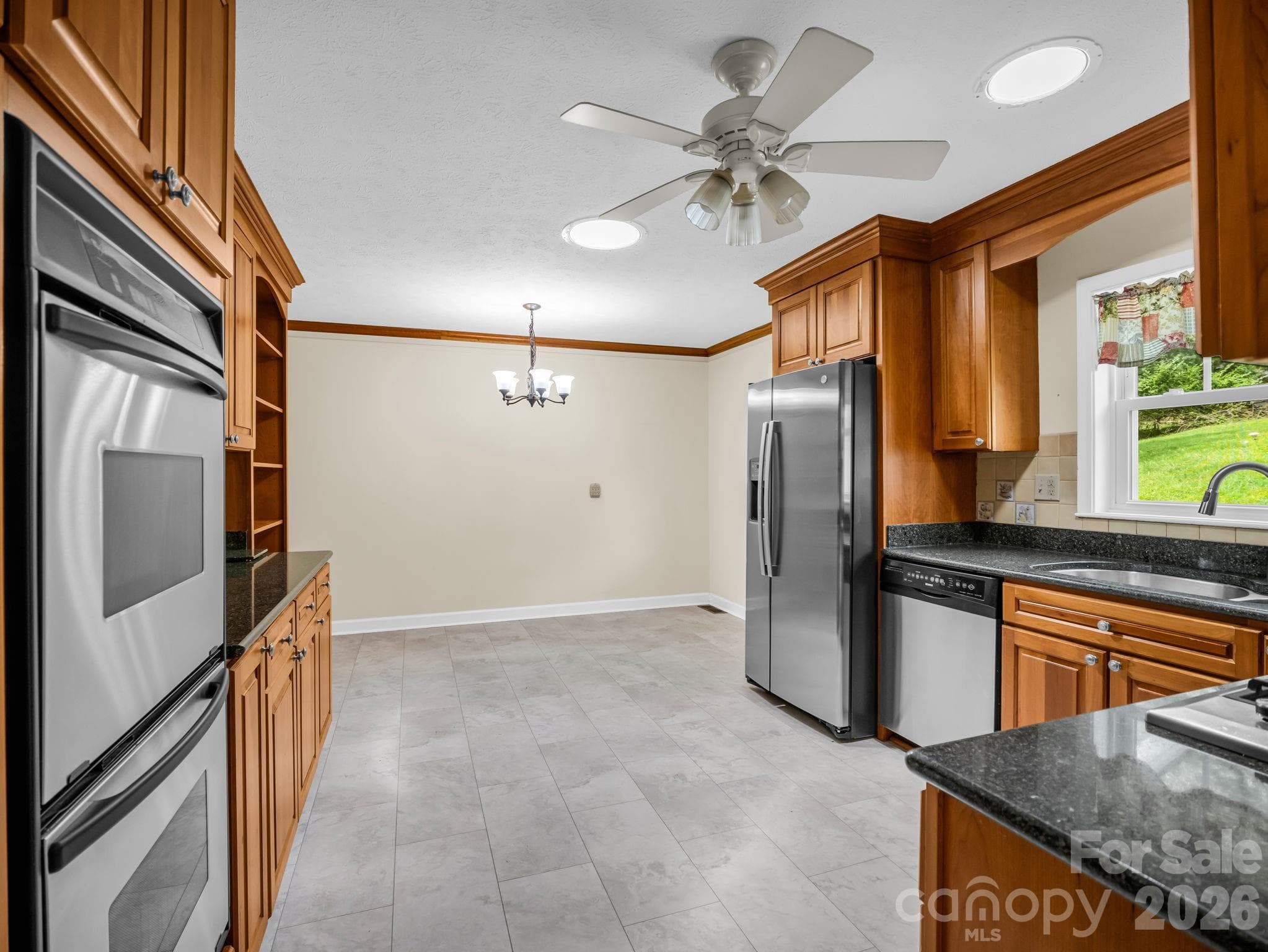 Kitchen with new tile flooring - 370 Orchard Circle, Laurel Park