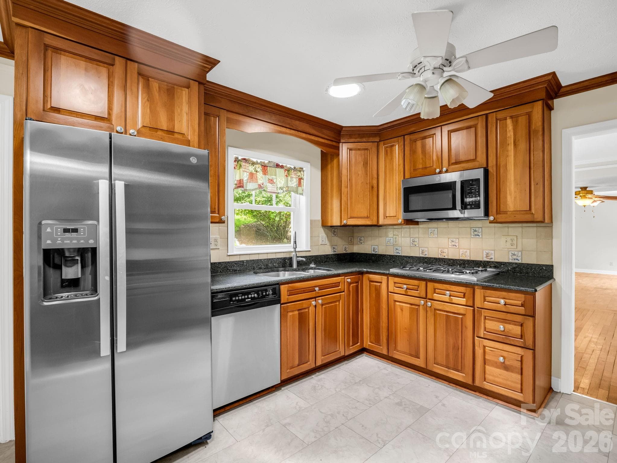 Kitchen with stainless steel appliances - 370 Orchard Circle, Laurel Park