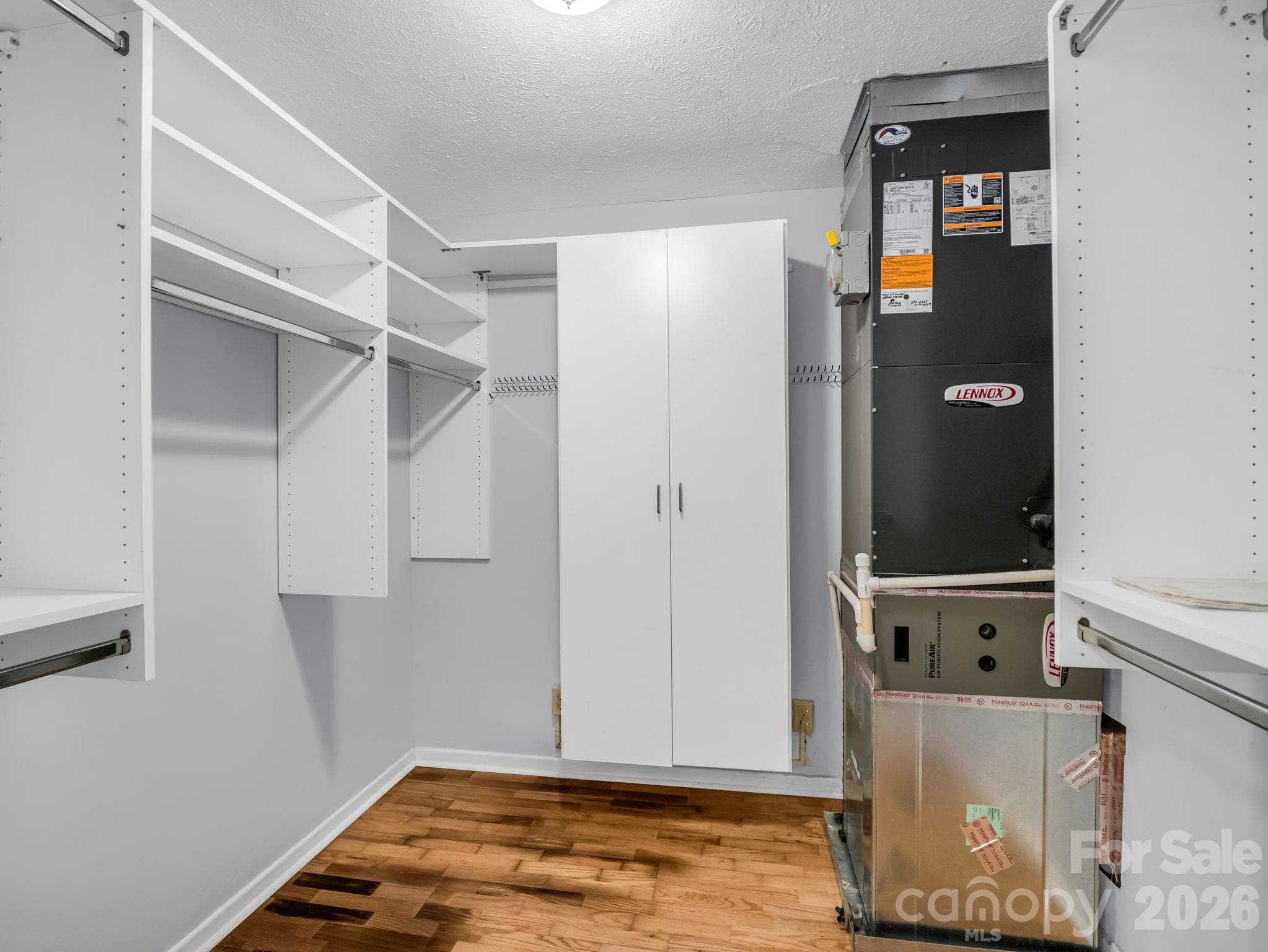 Primary Bedroom Walk-In Closet - 370 Orchard Circle, Laurel Park