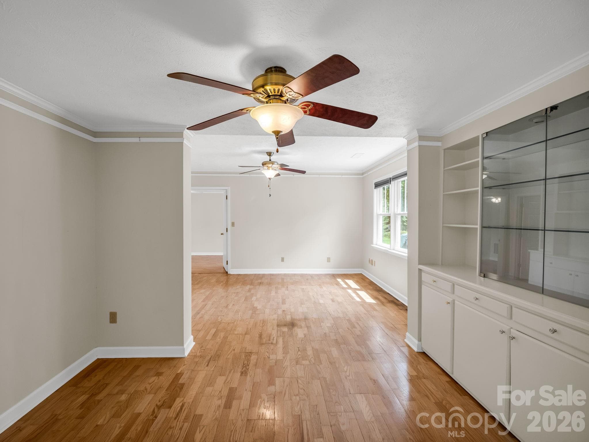 Cozy sitting area with built in cabinets - 370 Orchard Circle, Laurel Park