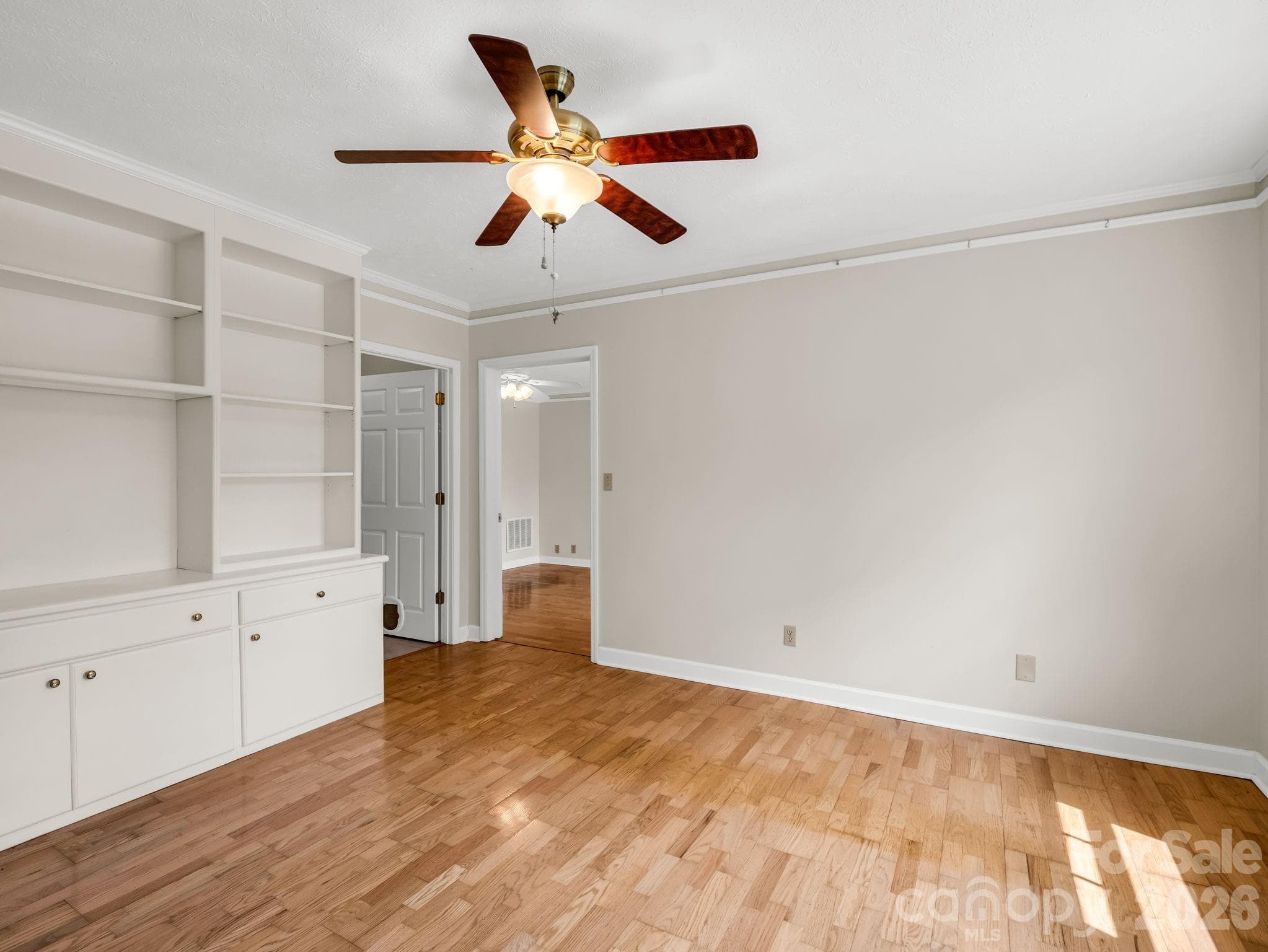 Sitting Room. Door to the left is laundry room before going into primary ensuite. - 370 Orchard Circle, Laurel Park