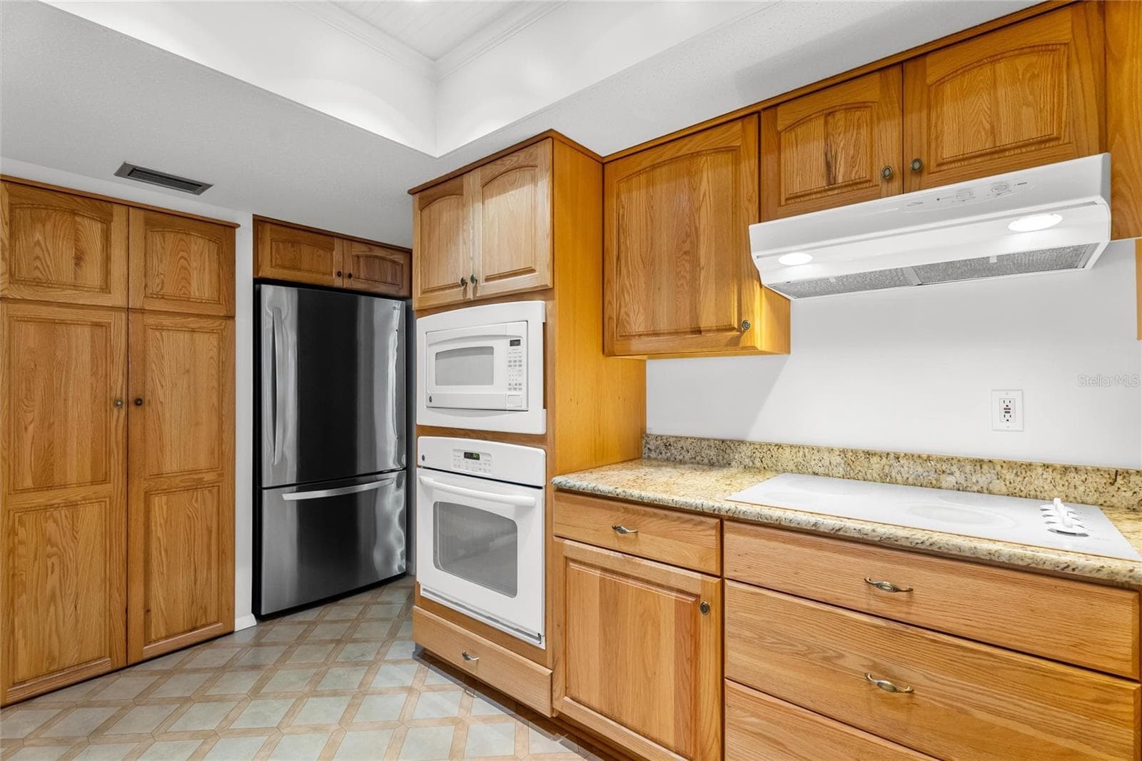 pantry behind the long cabinet - 773 VIVIENDA SOUTH CT #8, VENICE