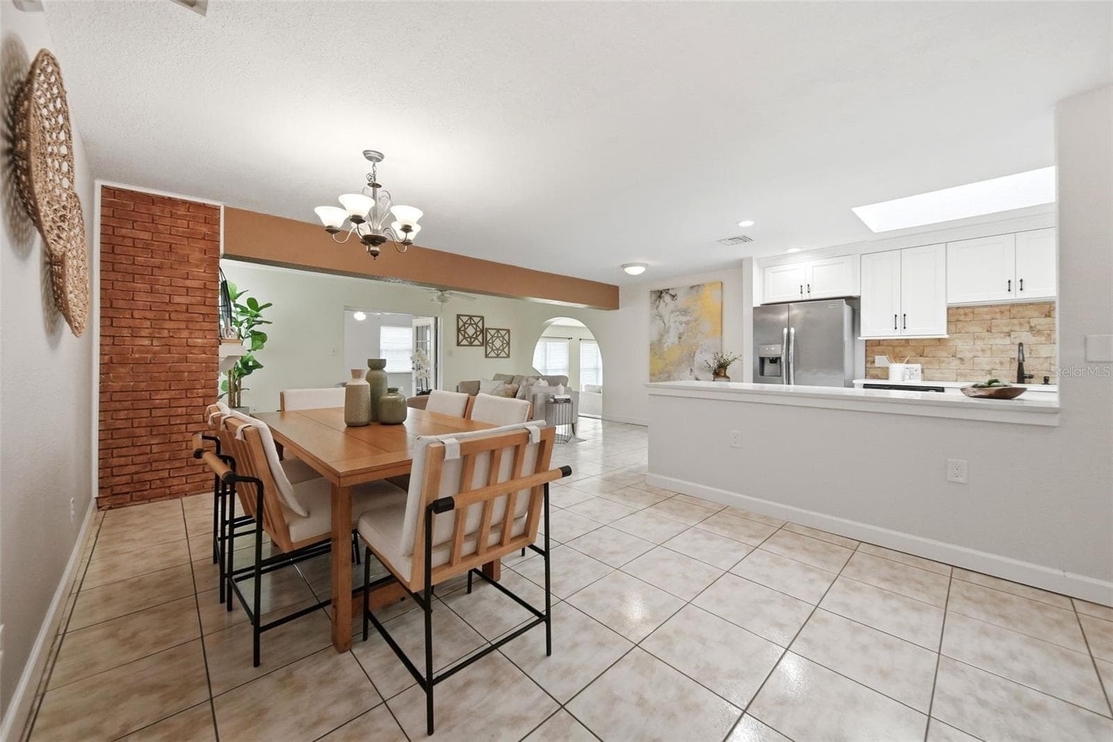 Formal dining room, living room, fireplace. - 1540 E HORATIO AVE, MAITLAND