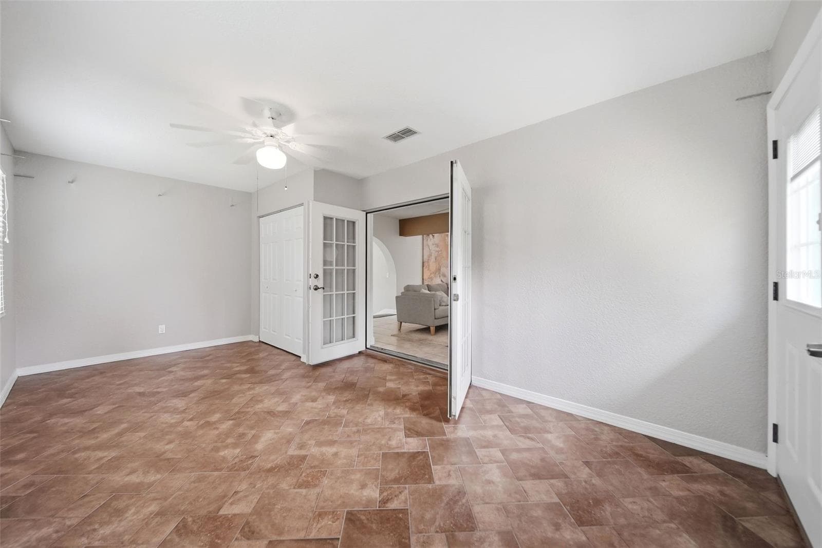 Enclosed patio | bedroom space | bonus room | flex space | home office - 1540 E HORATIO AVE, MAITLAND
