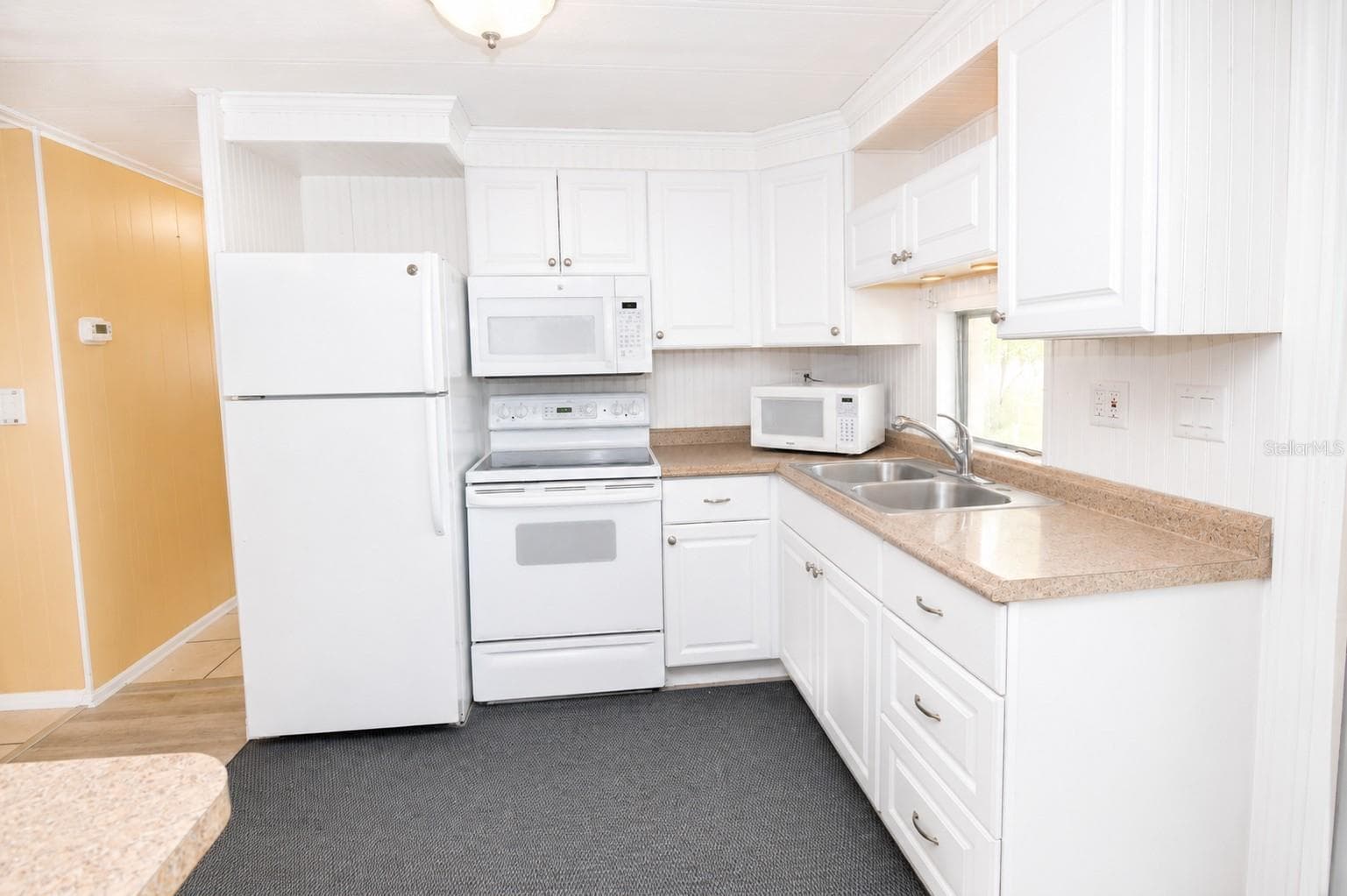 Mobile Home at 115 RACHEL DR, TARPON SPRINGS, photo 6 of 25