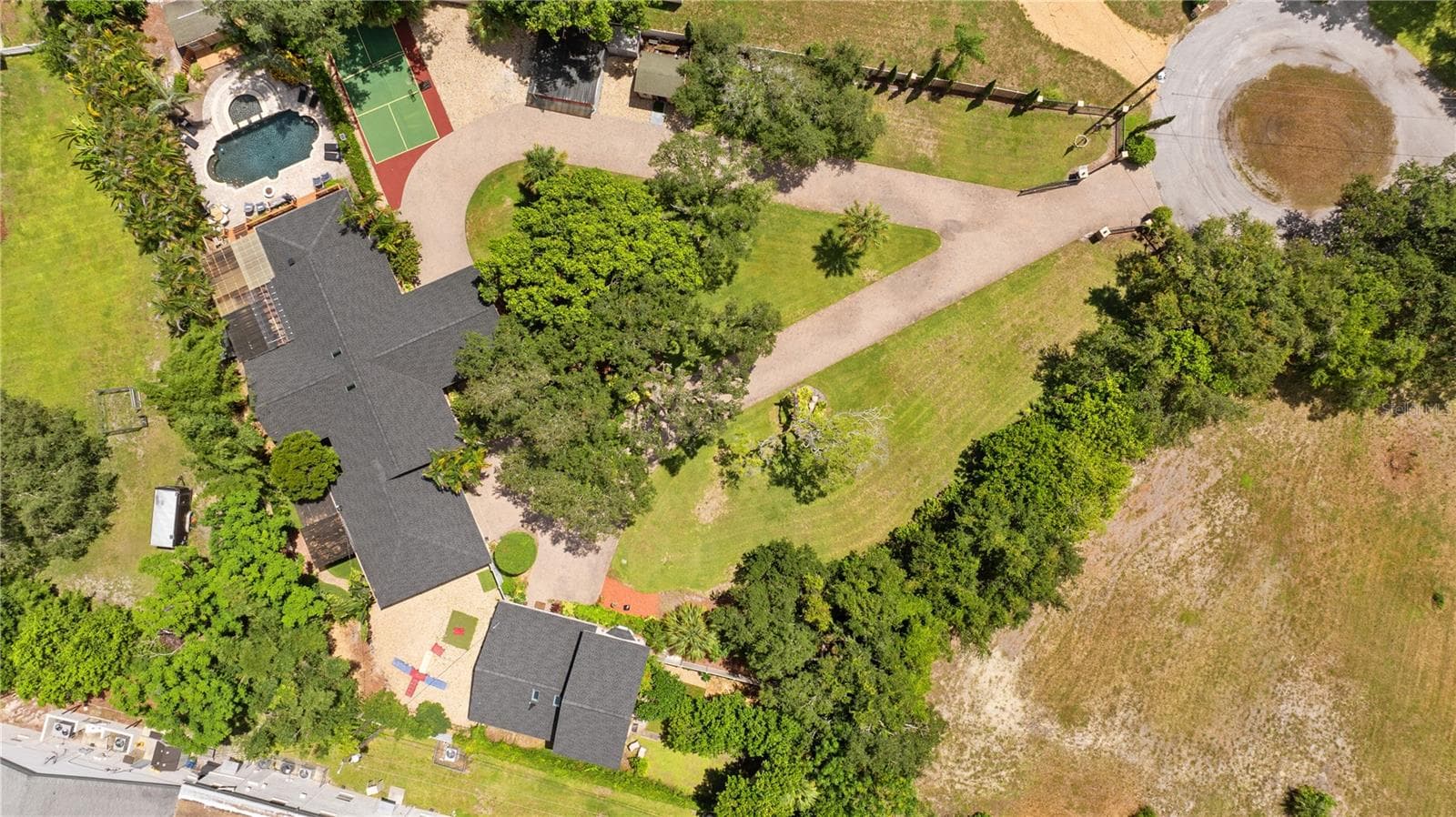 Aerial View of Home, Pool & Drive - 20 BOGIE LN, PALM HARBOR