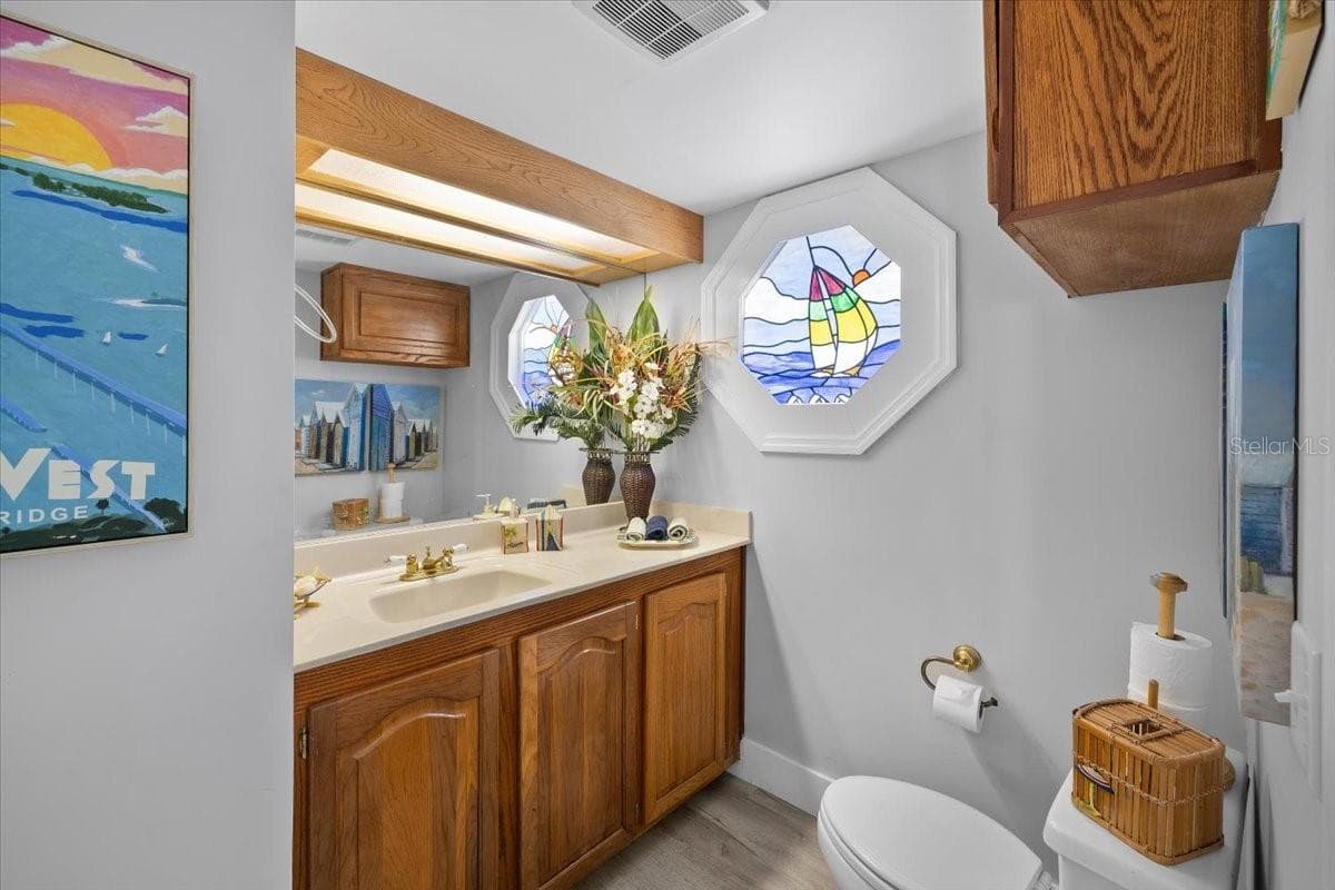 Half bath lower floor - 3200 GULF WINDS CIR, HERNANDO BEACH