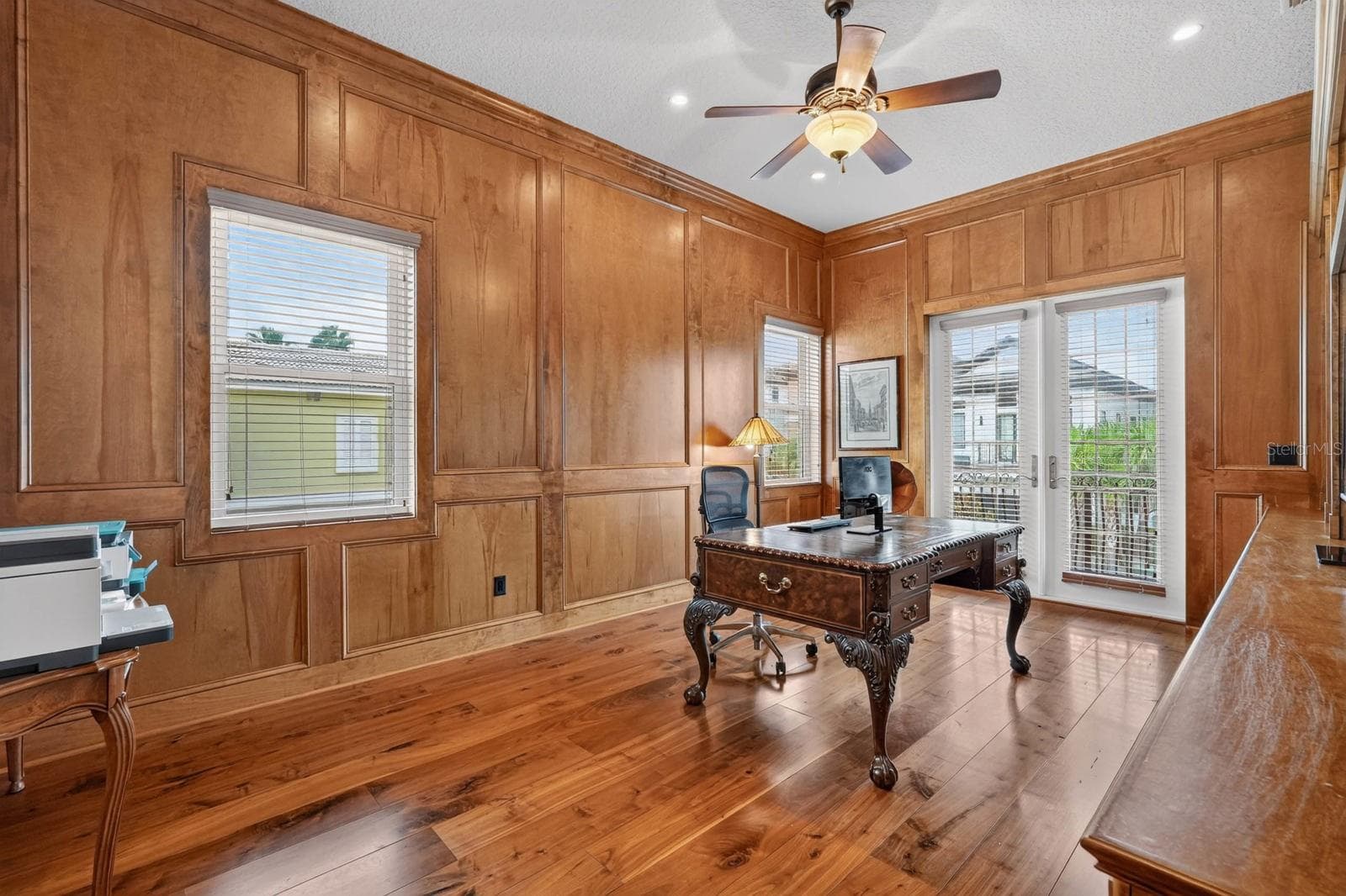 It’s all in the details... incredible woodwork and craftsmanship bring warmth and character to this private home office. - 303 YACHT HARBOR DR, PALM COAST