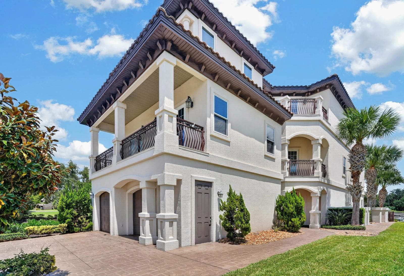 Expansive by design, with multiple levels of living and outdoor spaces to enjoy the Florida lifestyle. - 303 YACHT HARBOR DR, PALM COAST