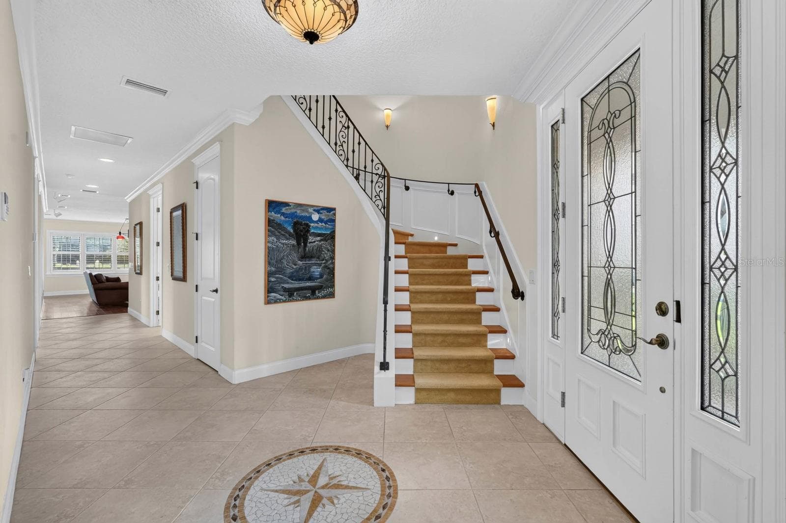 Take the stairs and admire the craftsmanship... or take the elevator. You get to choose. - 303 YACHT HARBOR DR, PALM COAST