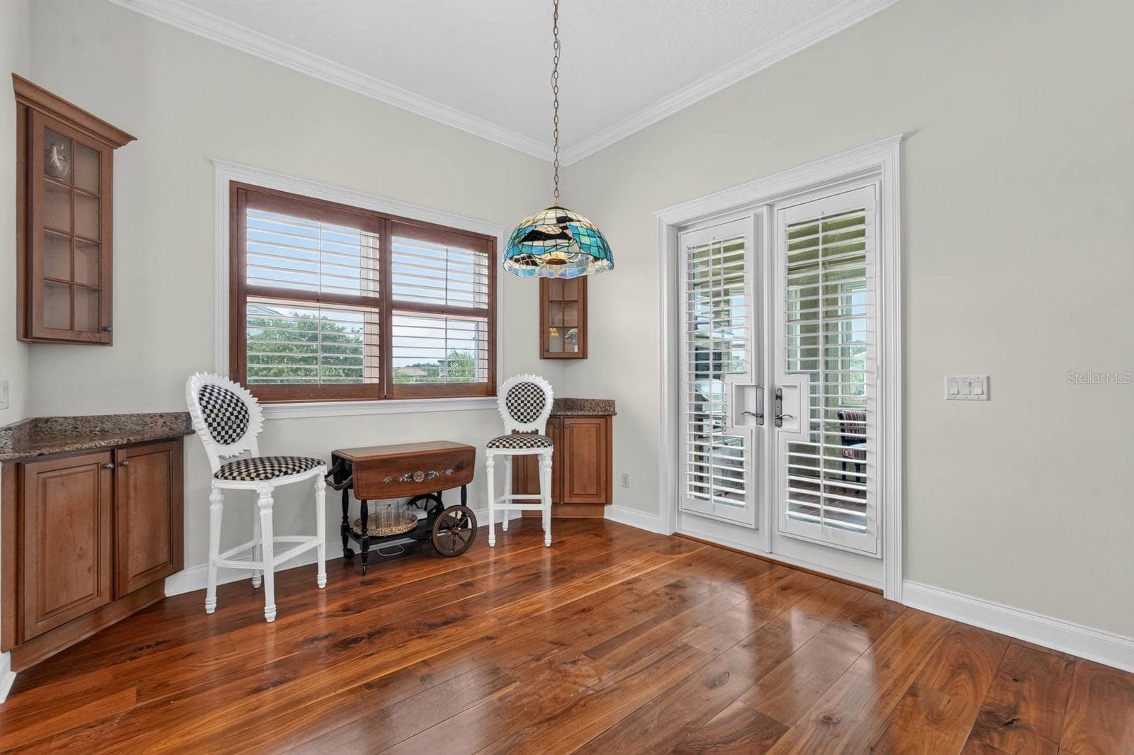 Just off the kitchen, a cozy nook creates the perfect spot for morning coffee, casual lunches and intimate gatherings. - 303 YACHT HARBOR DR, PALM COAST