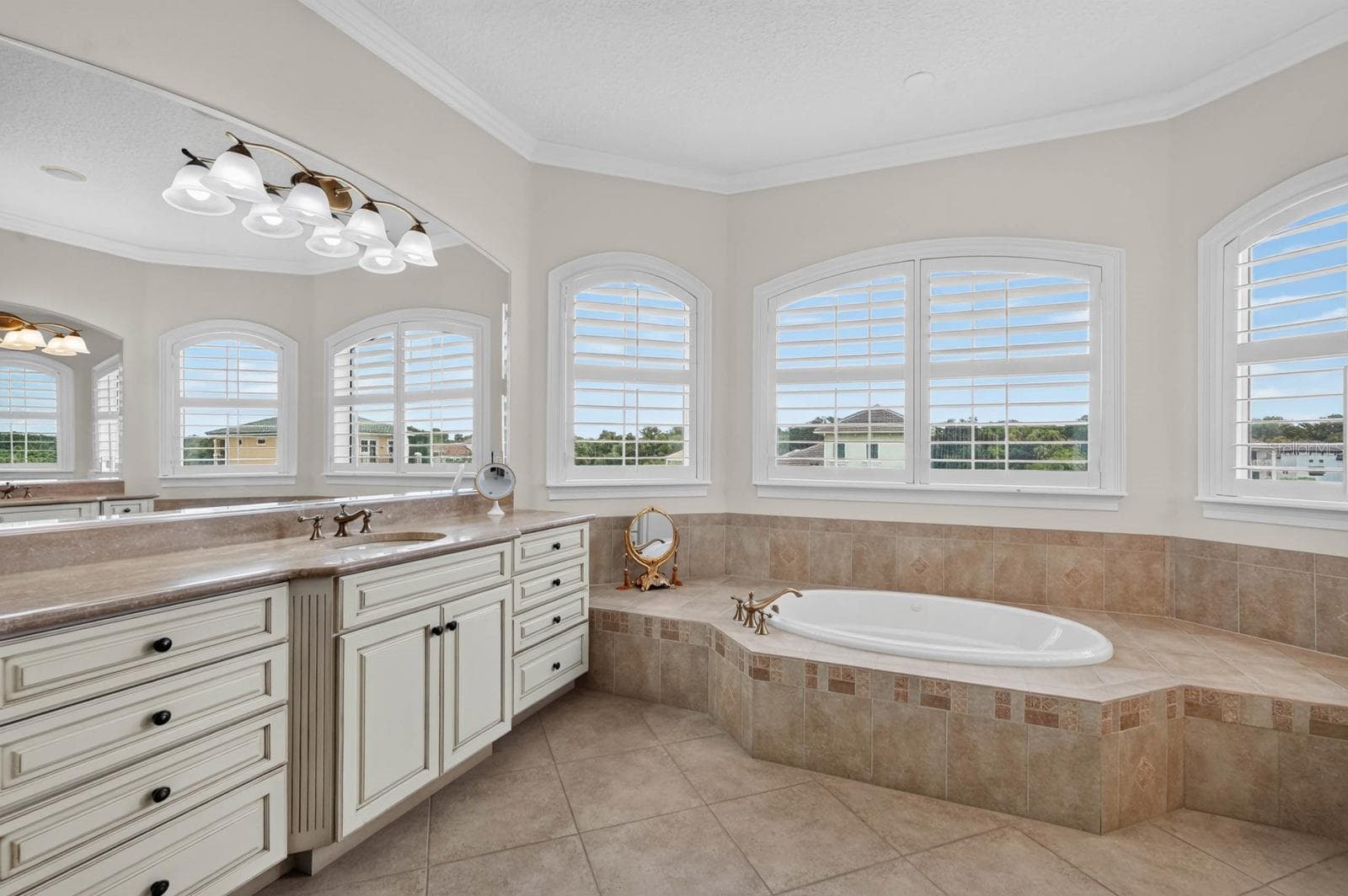 Two vanities, plenty of room and no need to share your morning routine. - 303 YACHT HARBOR DR, PALM COAST