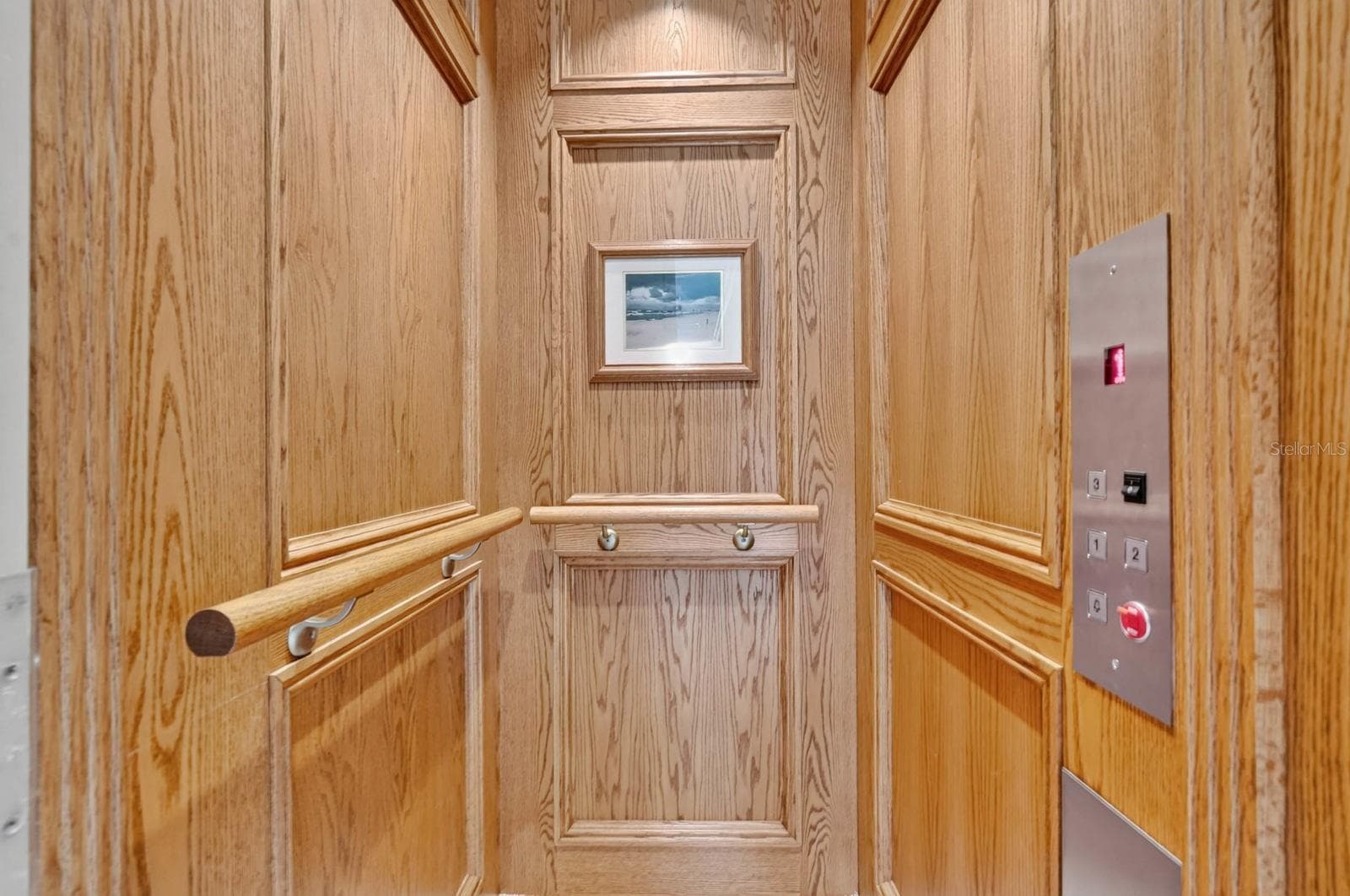Down to the first floor we go... because in a home of this scale, an elevator simply makes sense. - 303 YACHT HARBOR DR, PALM COAST