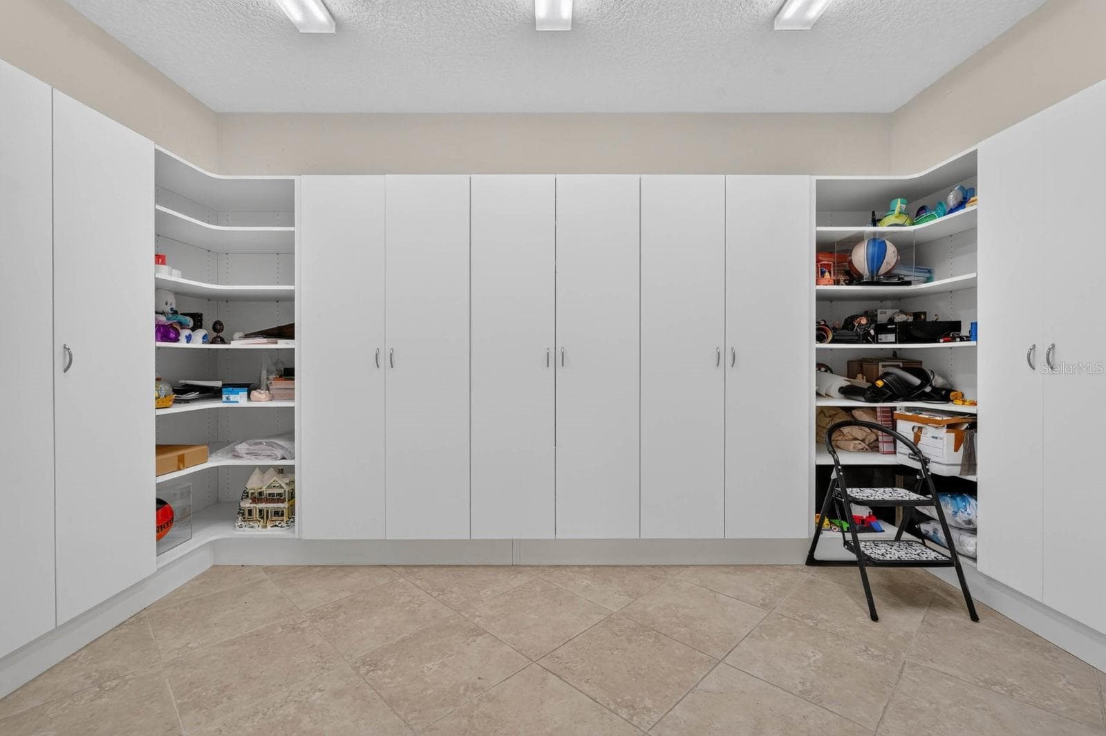 Storage is certainly not an afterthought here, with a dedicated storage room adding even more function. - 303 YACHT HARBOR DR, PALM COAST