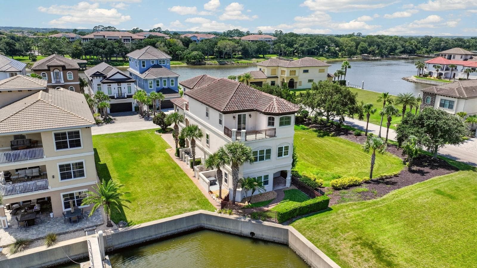 Imagine owning your waterfront home with no immediate neighbor on either side... the adjacent homesite is available separately, while HOA owned land provides additional separation on the other. - 303 YACHT HARBOR DR, PALM COAST