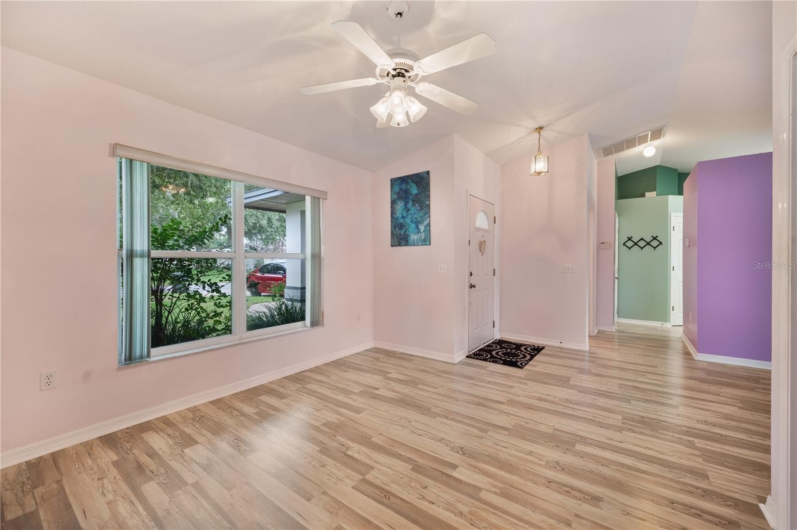 The "dining area" or living Room on the Virtual Walk Through - 1660 GAMEWELL TRL, LAKELAND