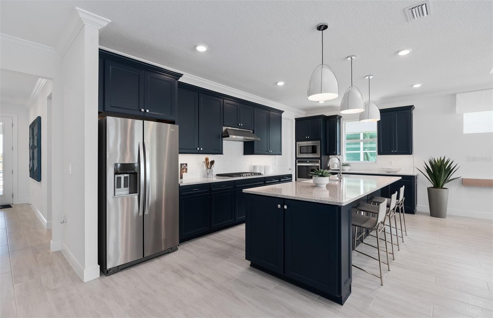 Model Home Design Only. Pictures and furnishings are for illustrative purposes only. Elevations, colors and options may vary. Furniture is for model home staging only. - 1313 ZESTY CITRUS LANE, MINNEOLA