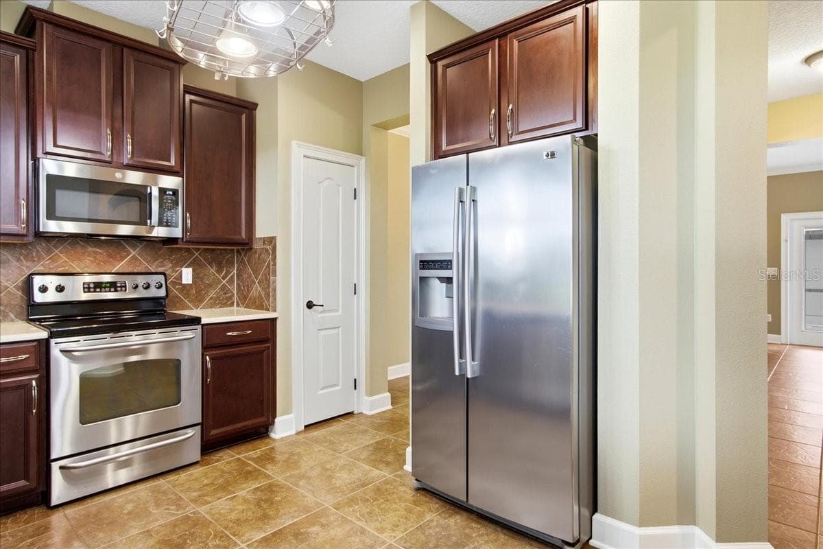 Townhouse at 7430 BENTONSHIRE AVE, WINDERMERE, photo 13 of 59