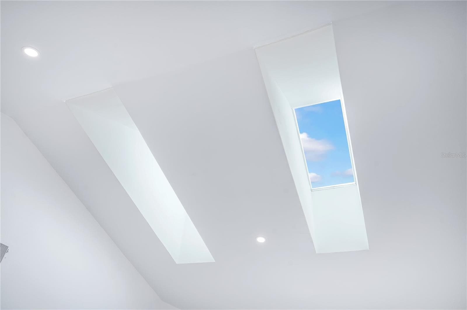 Skylights bring abundant natural light into the open living space. - 3012 S SEMORAN BLVD #G2, ORLANDO