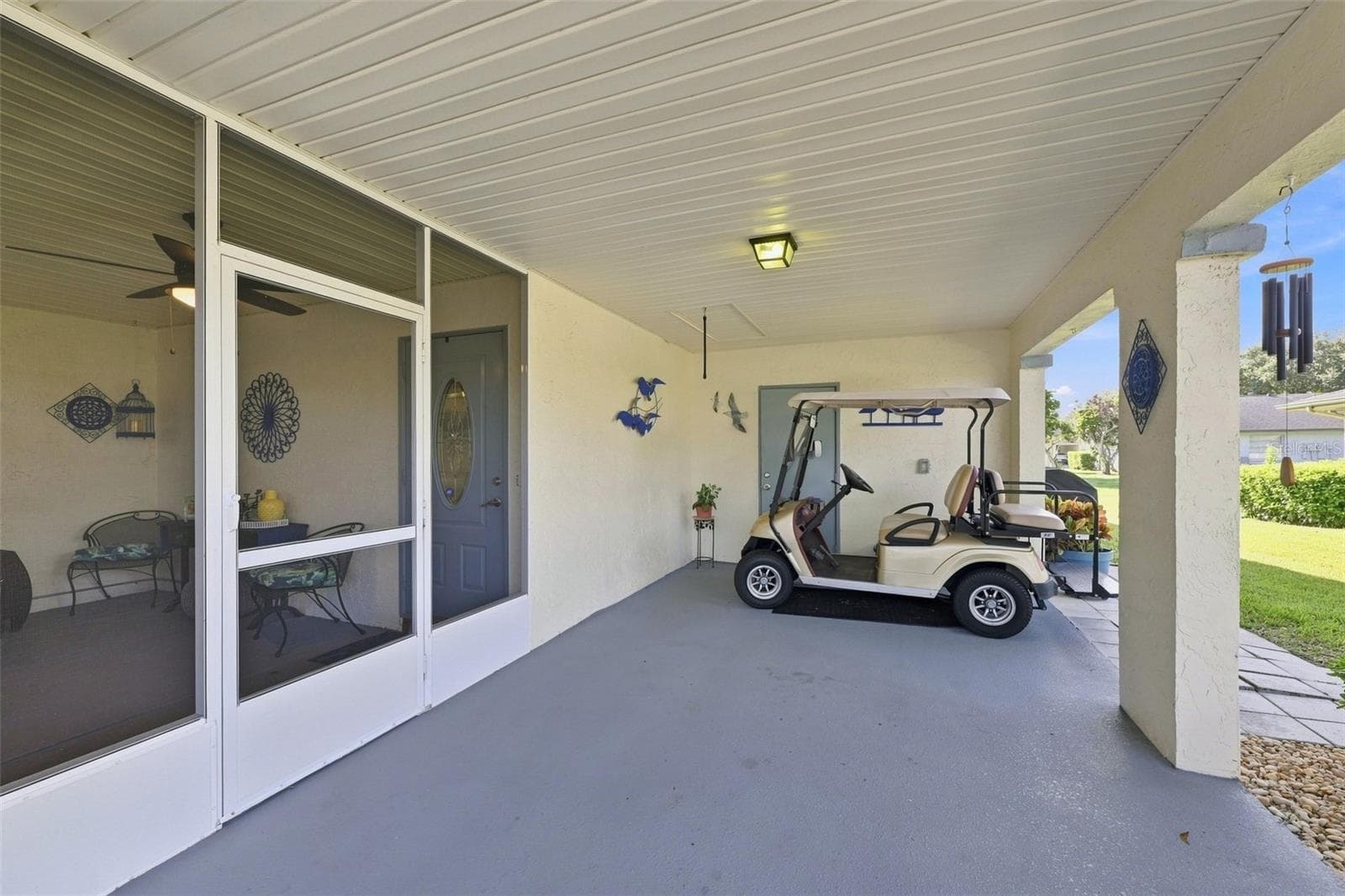 Carport, with entrance to Front Porch - 2005 HEATHFIELD CIR #241, SUN CITY CENTER