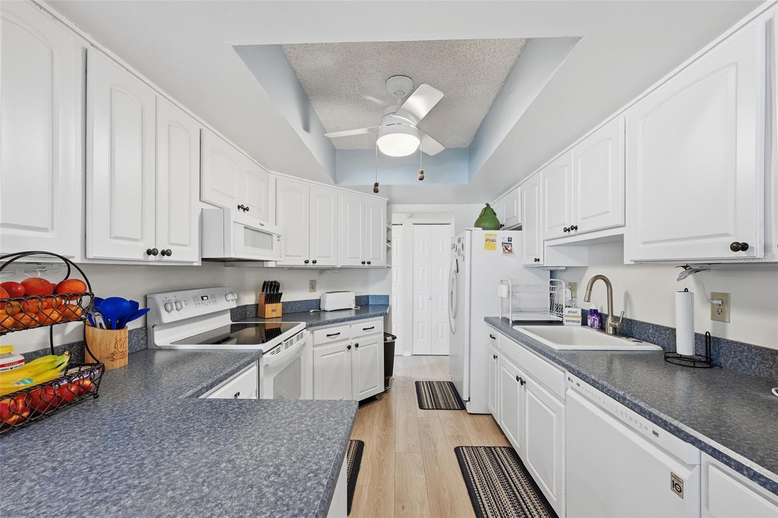 Kitchen - lots of Counter space & storage cabinets - 2005 HEATHFIELD CIR #241, SUN CITY CENTER