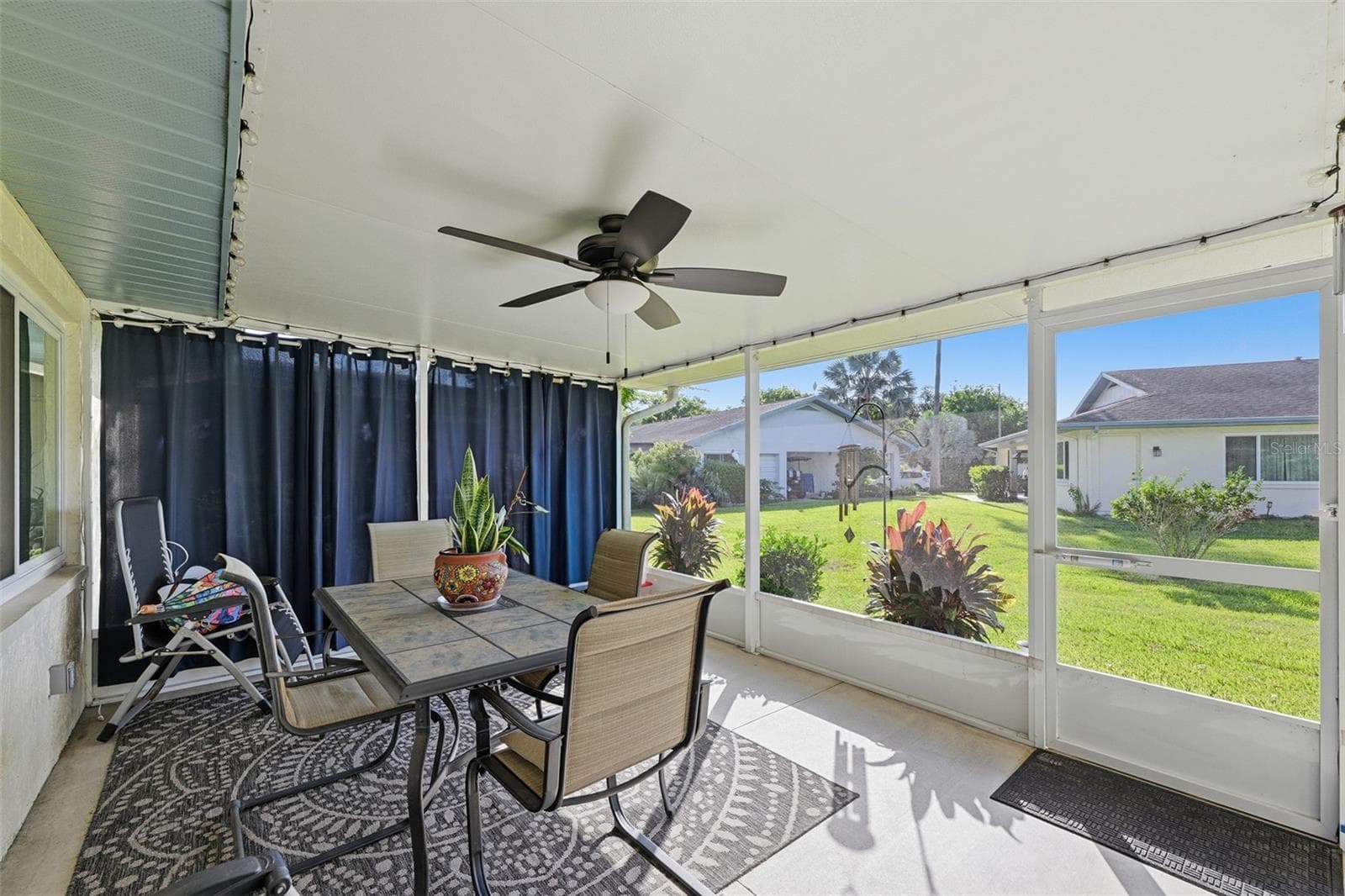 Newly installed Covered, screened Lanai at back of house - 2005 HEATHFIELD CIR #241, SUN CITY CENTER