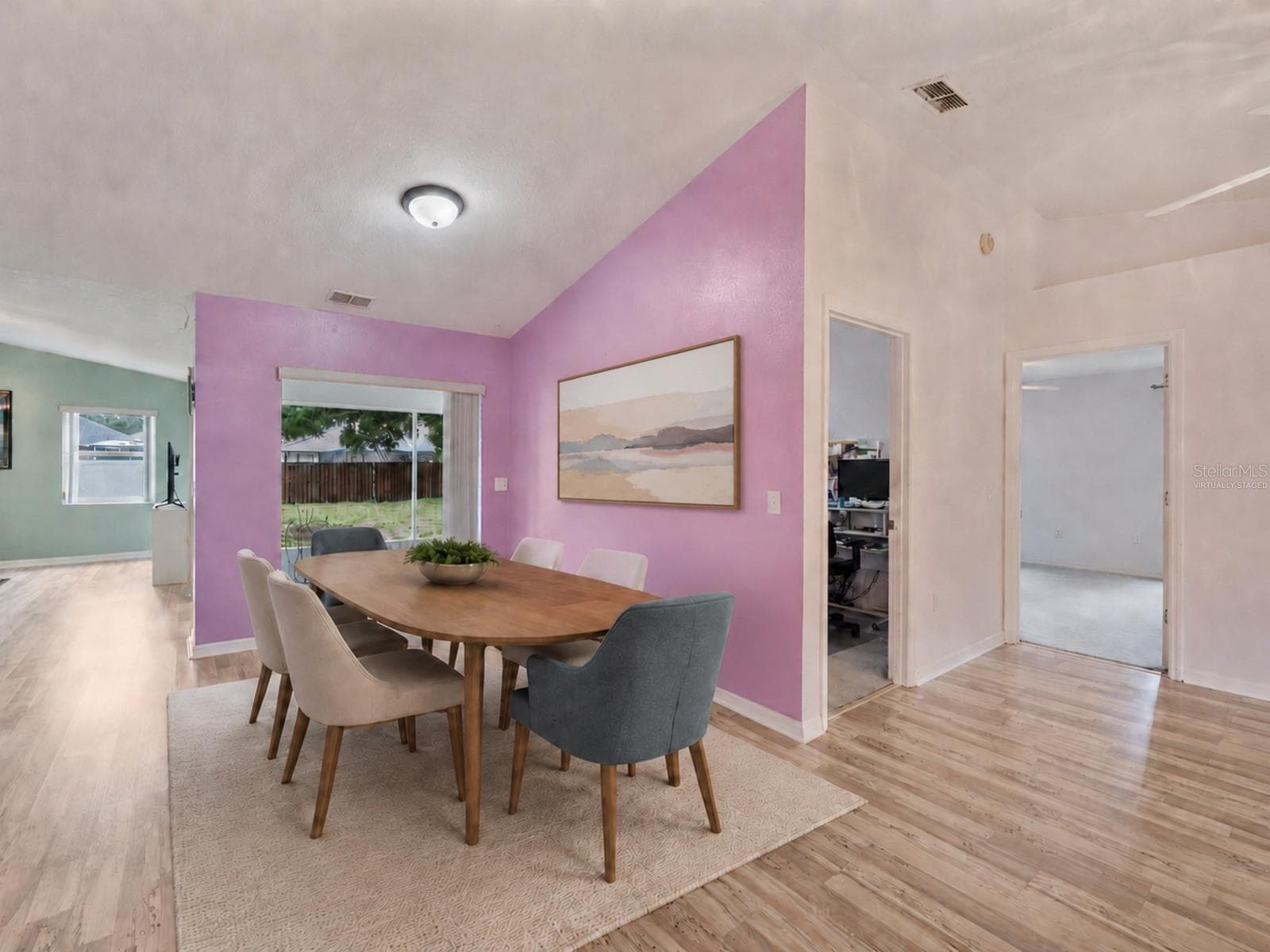 Dining area, open ip to the lanai - Virtually Staged to enhance experience. - 1660 GAMEWELL TRL, LAKELAND
