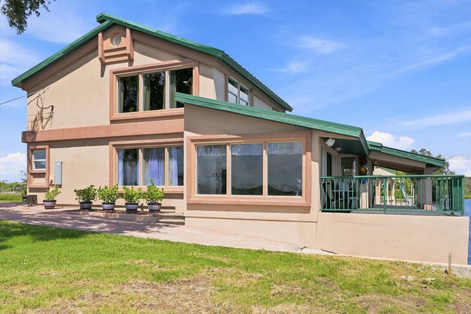 Waterside Exterior – Enclosed Waterfront Living Area - 3194 INDIAN GULF LN, HERNANDO BEACH