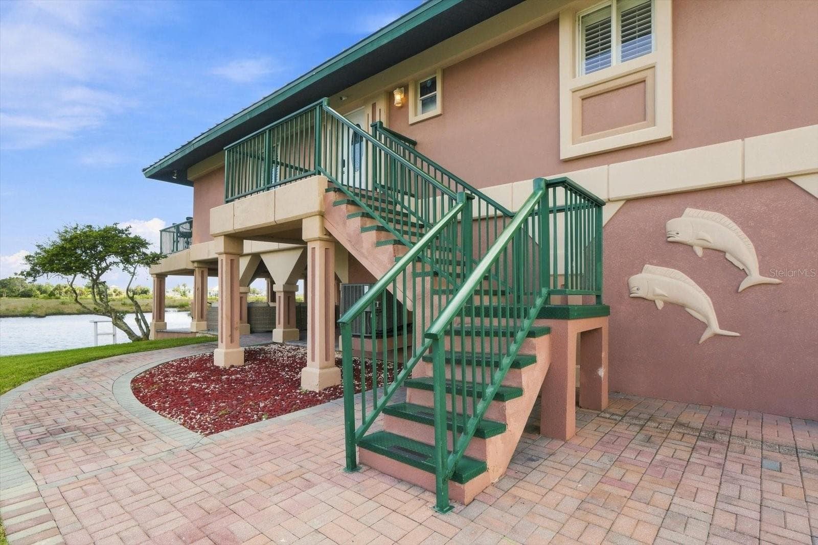 Exterior stairway providing access to the upper-level residence. - 3198 INDIAN GULF LN, HERNANDO BEACH