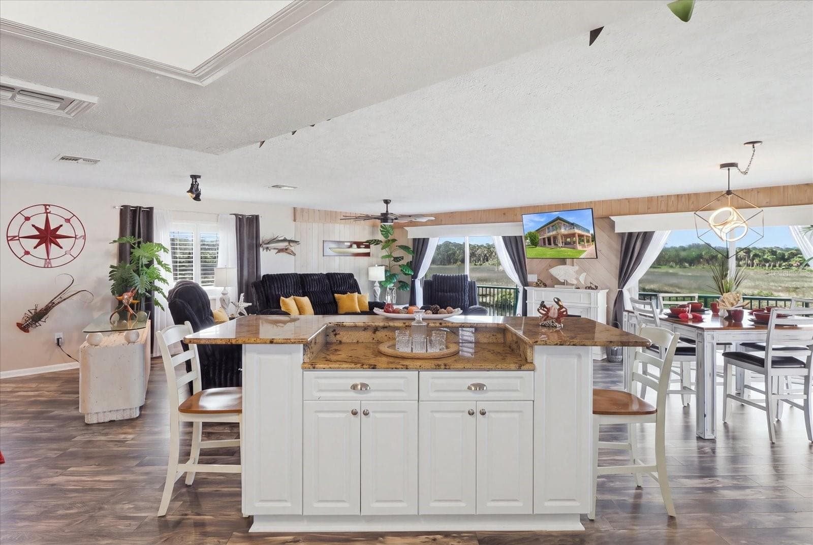 Expansive open-concept kitchen, living, and dining area. - 3198 INDIAN GULF LN, HERNANDO BEACH