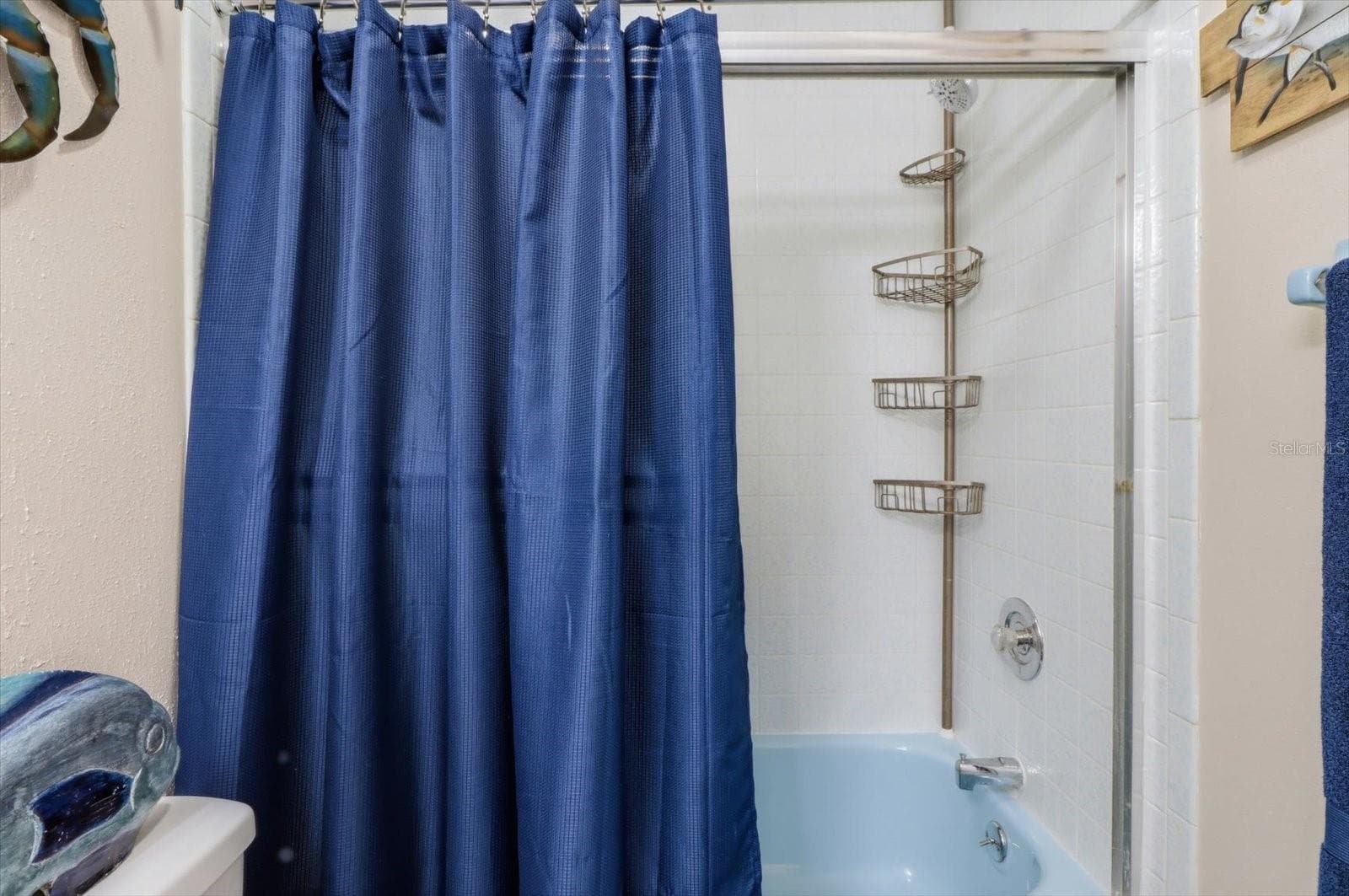 Tub and shower detail in the guest bathroom. - 3198 INDIAN GULF LN, HERNANDO BEACH