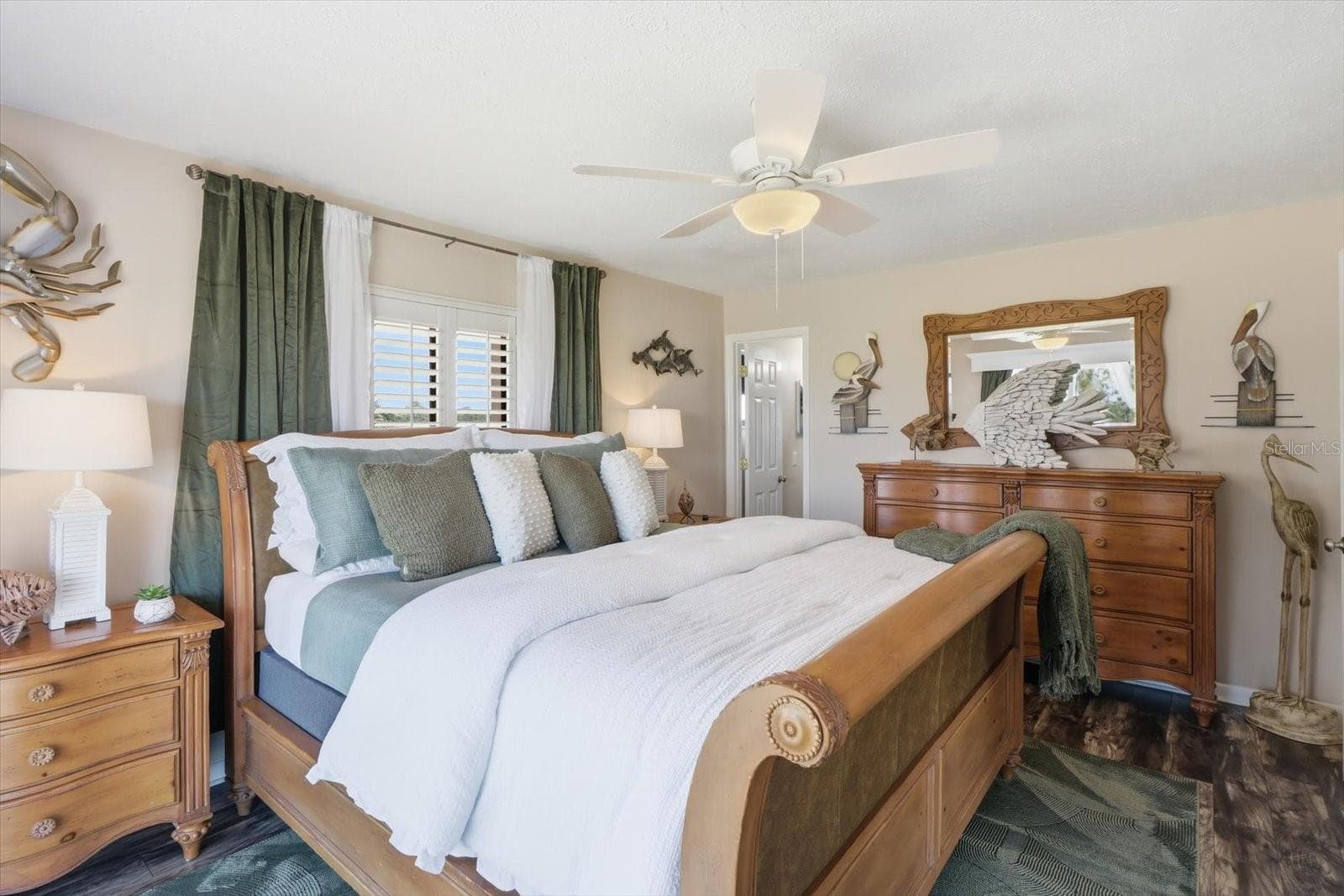 Primary bedroom with coordinated coastal furnishings. - 3198 INDIAN GULF LN, HERNANDO BEACH