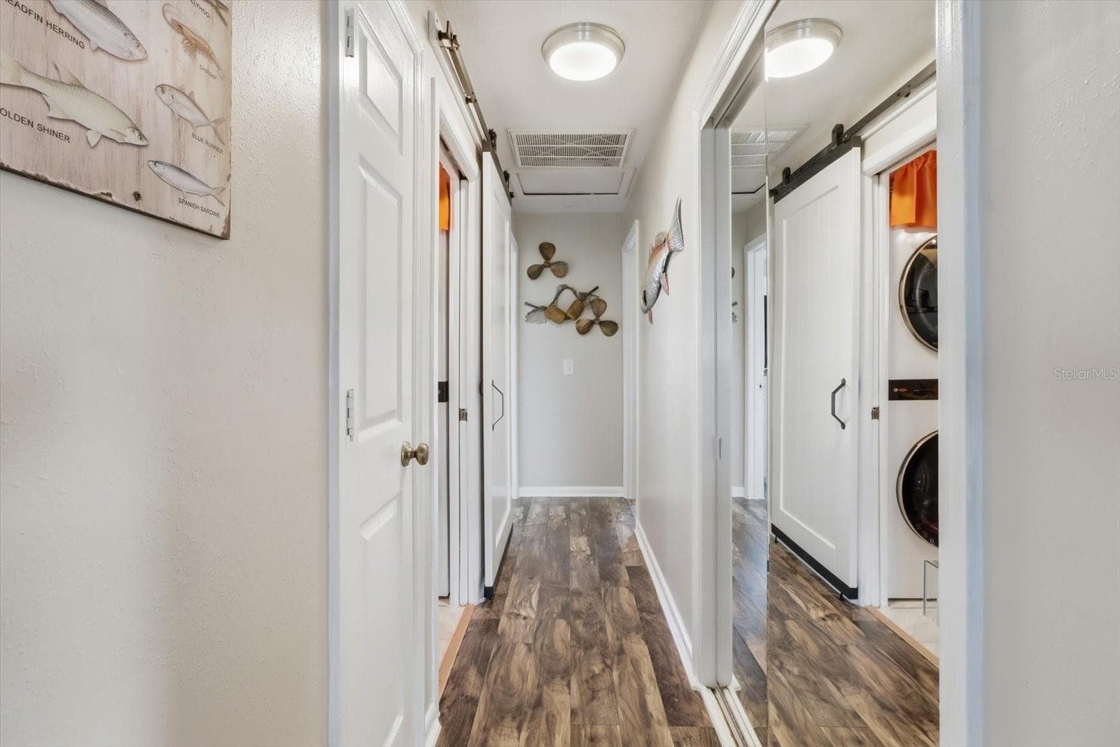 Interior hallway with convenient access to the laundry area. - 3198 INDIAN GULF LN, HERNANDO BEACH