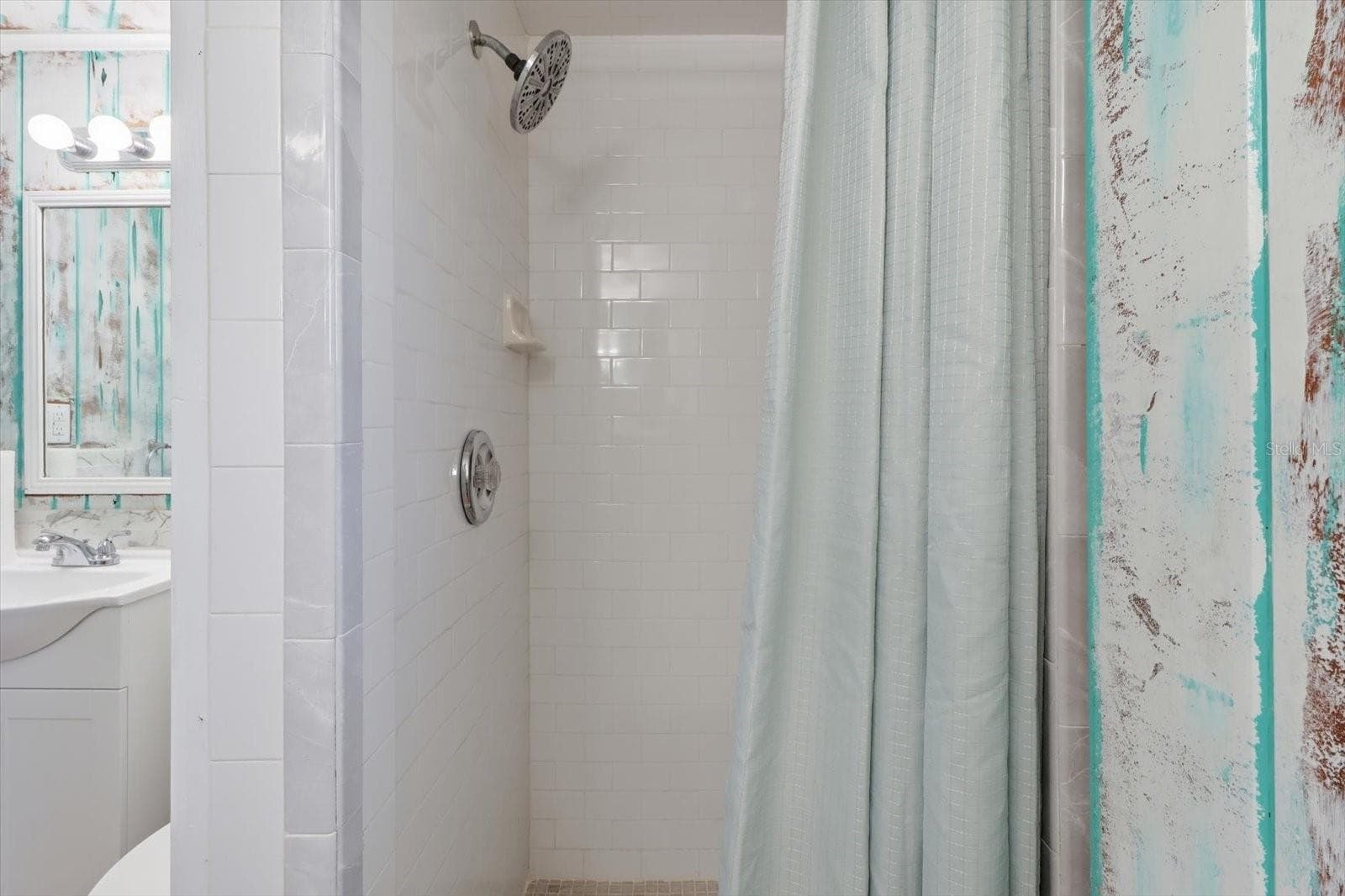 Walk-in shower detail with tiled surround. - 3198 INDIAN GULF LN, HERNANDO BEACH
