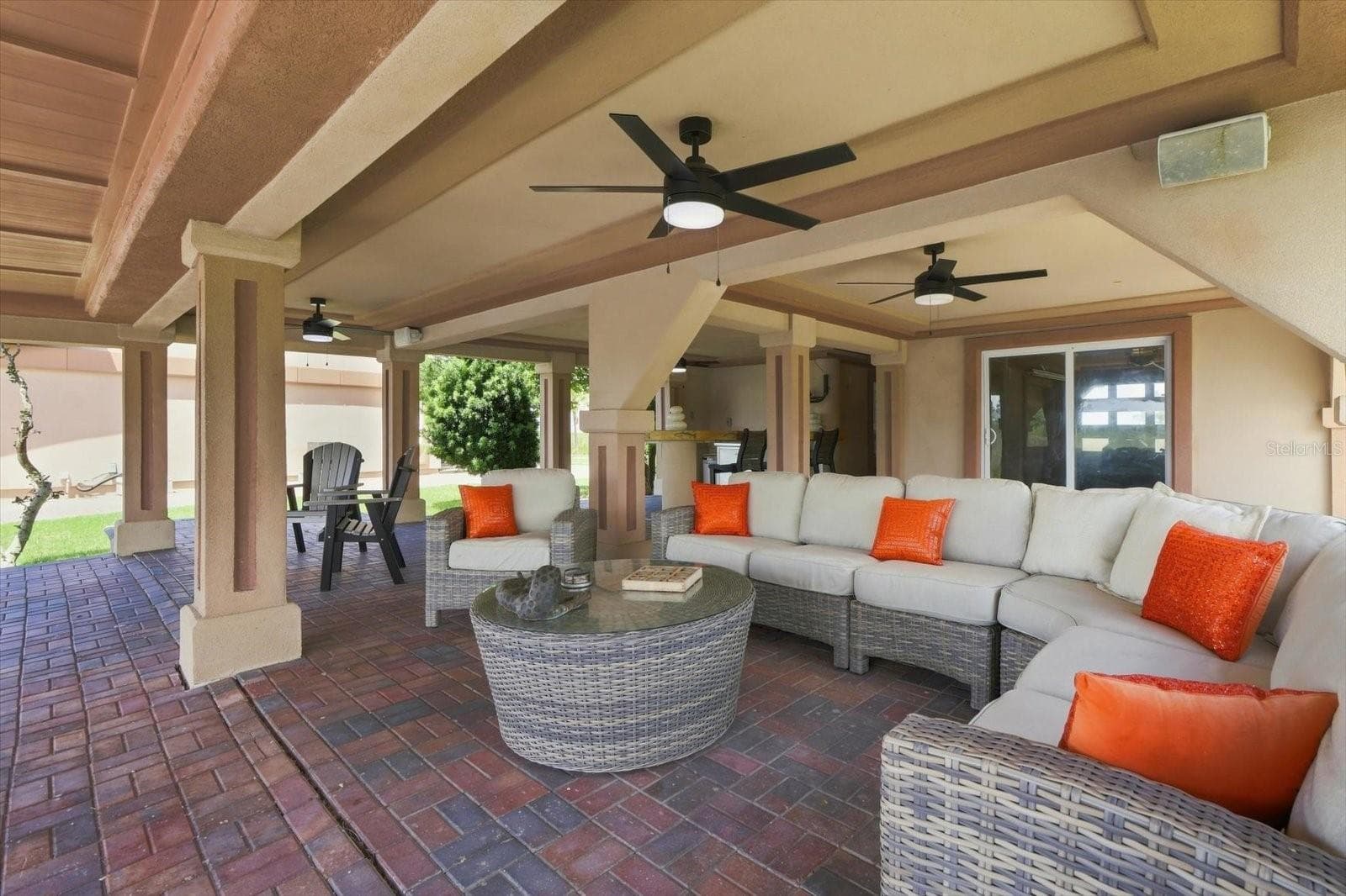 Additional perspective of the covered patio and multiple seating areas. - 3198 INDIAN GULF LN, HERNANDO BEACH