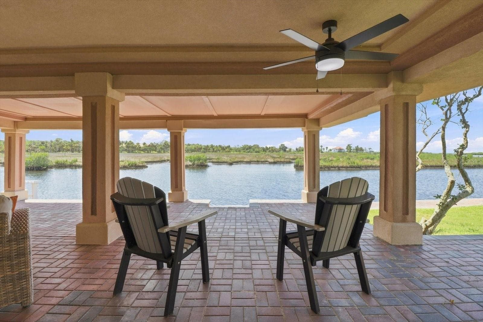 Relaxation area oriented toward the water and surrounding natural scenery. - 3198 INDIAN GULF LN, HERNANDO BEACH