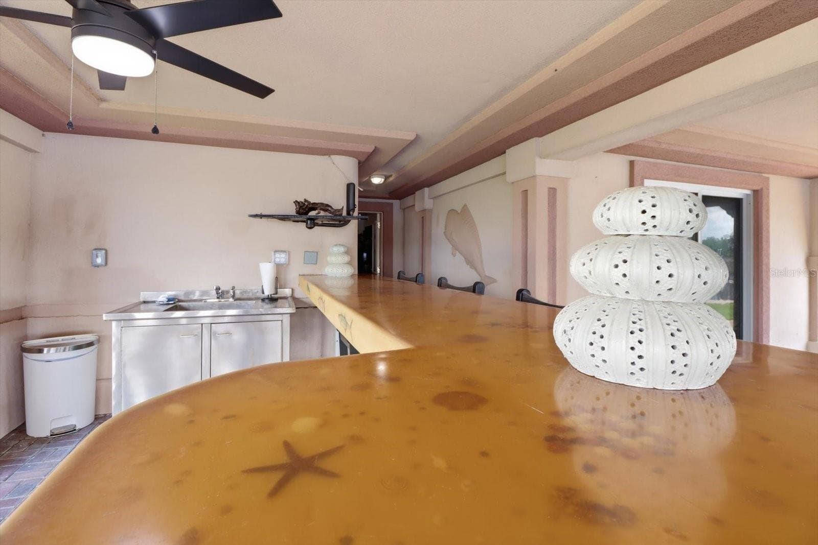 Custom bar top with distinctive coastal-themed detailing. - 3198 INDIAN GULF LN, HERNANDO BEACH