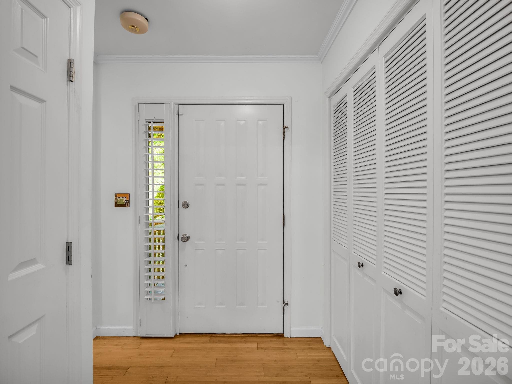 Foyer entrance with sidelight/coat closet & pantry with laundry - 335 Melrose Avenue, Tryon
