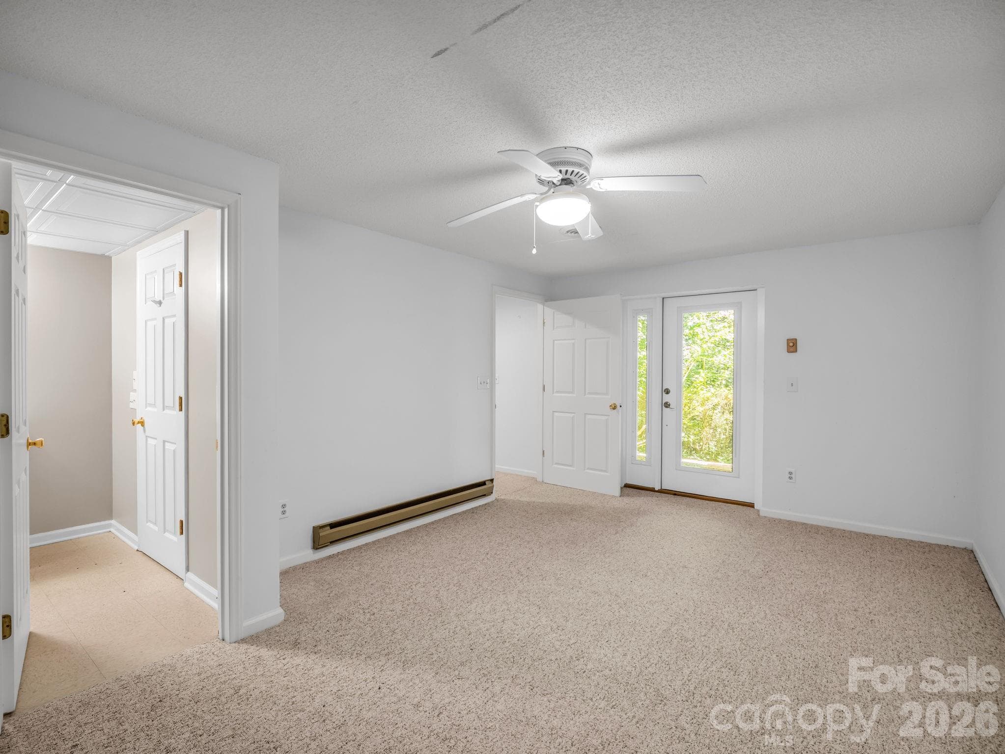 Double doors to patio. 2nd. lower bedroom or Office/recreation room - 335 Melrose Avenue, Tryon