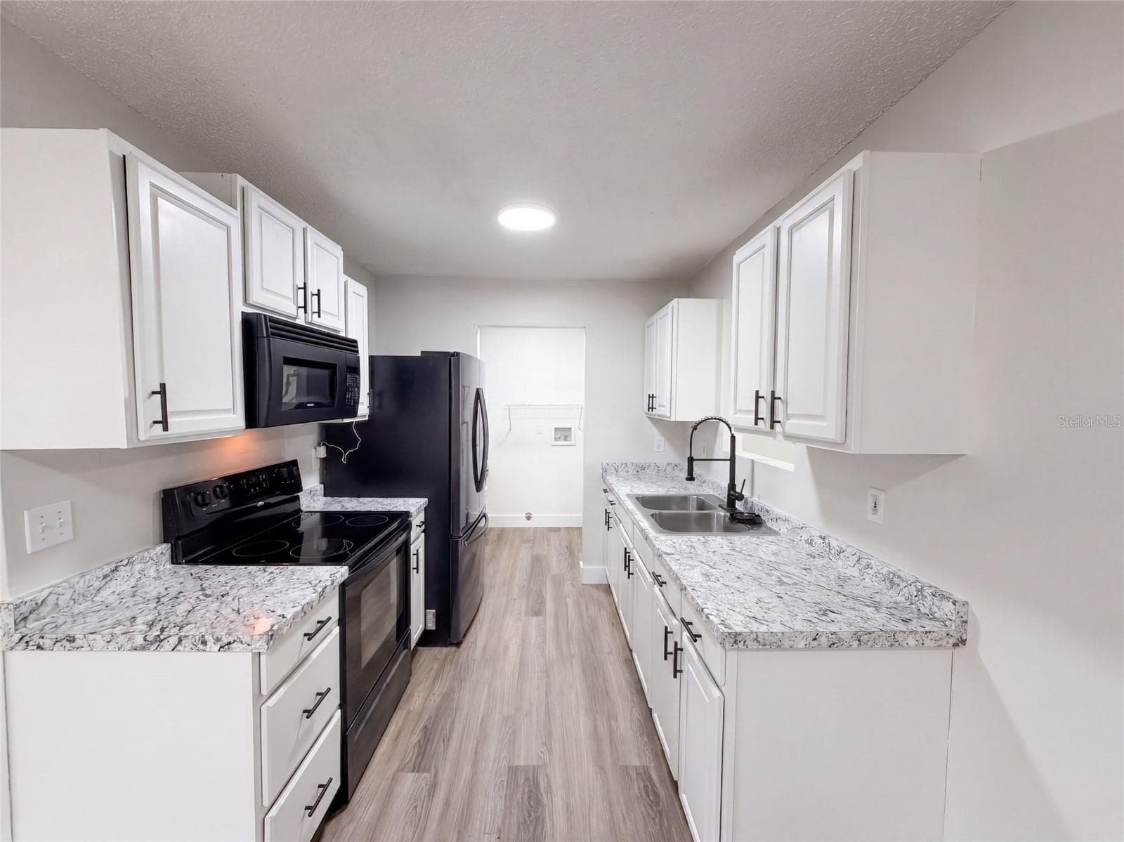 Single Family Residence at 9307 8TH AVE, ORLANDO, photo 2 of 32