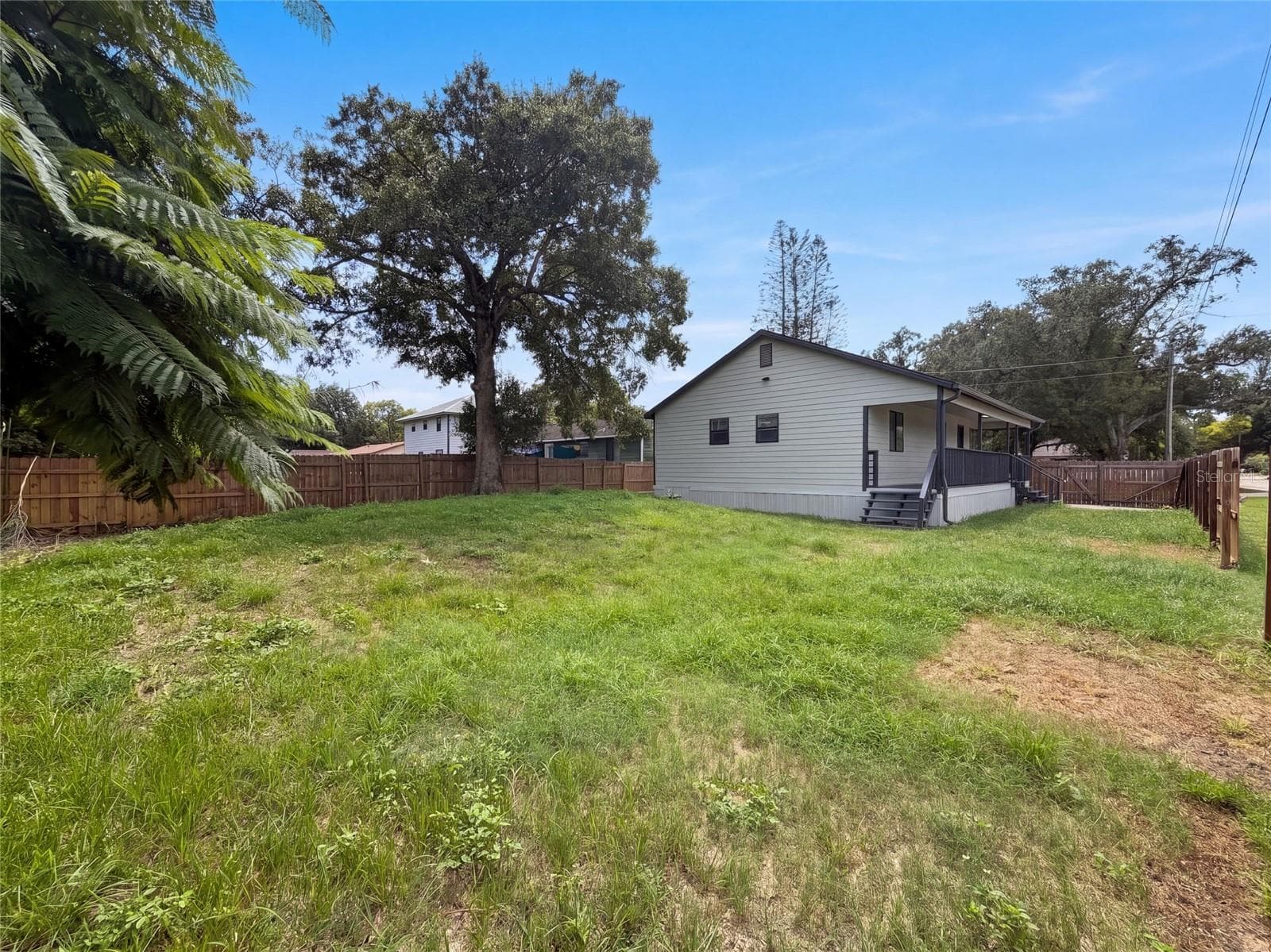 Single Family Residence at 9307 8TH AVE, ORLANDO, photo 5 of 32