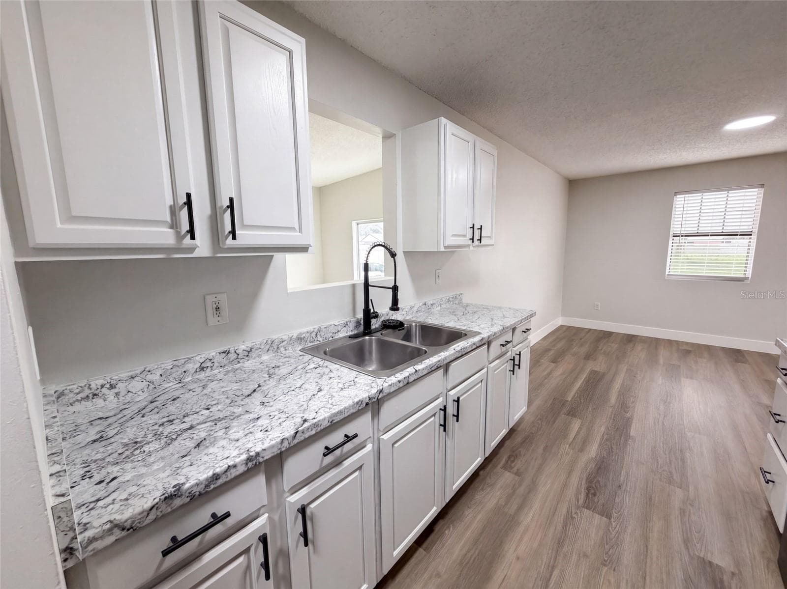 Single Family Residence at 9307 8TH AVE, ORLANDO, photo 6 of 32